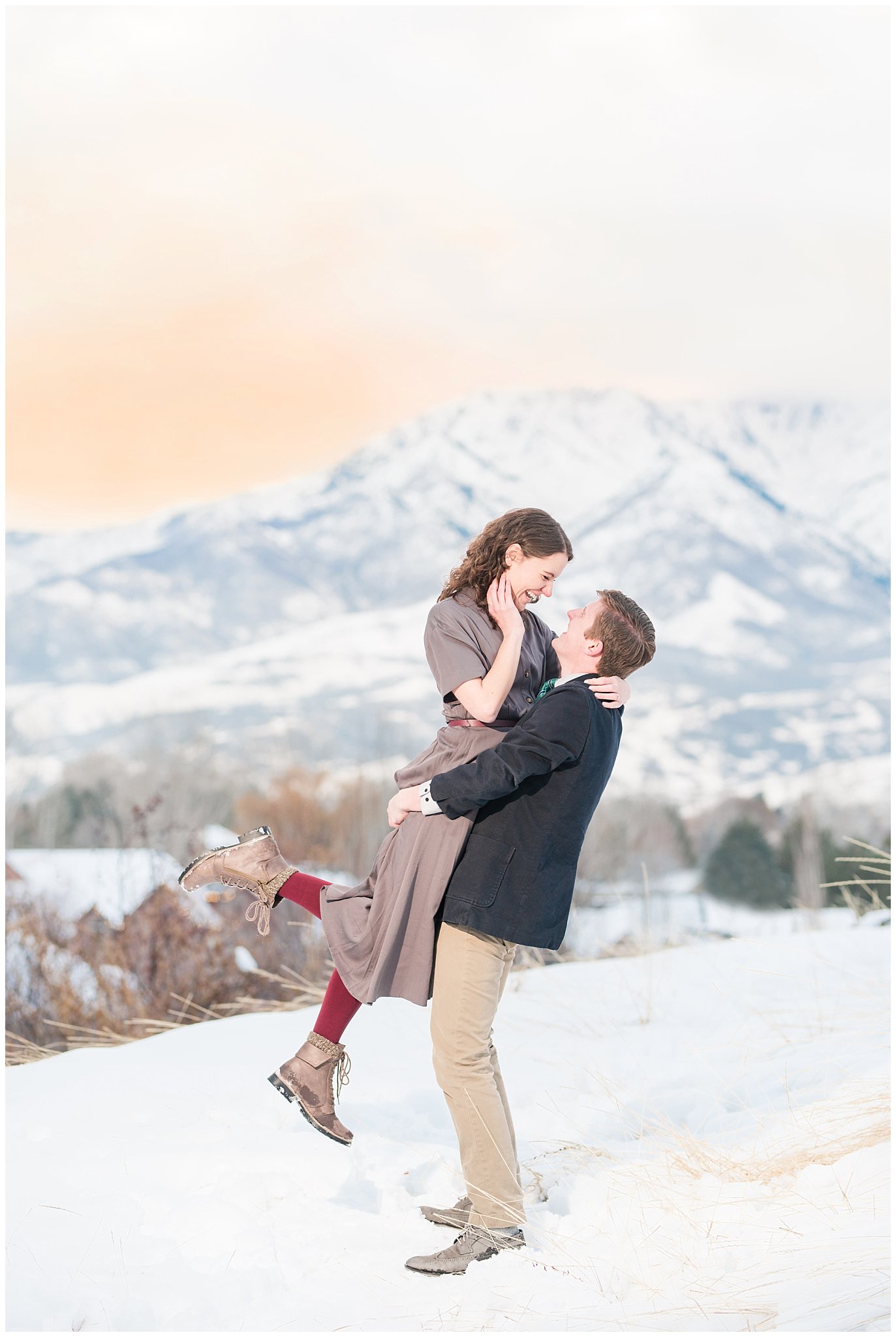 Couple does a romantic lift at sunset in the snowy Utah mountains | Top Utah Wedding and Couples Photos 2019 | Jessie and Dallin Photography