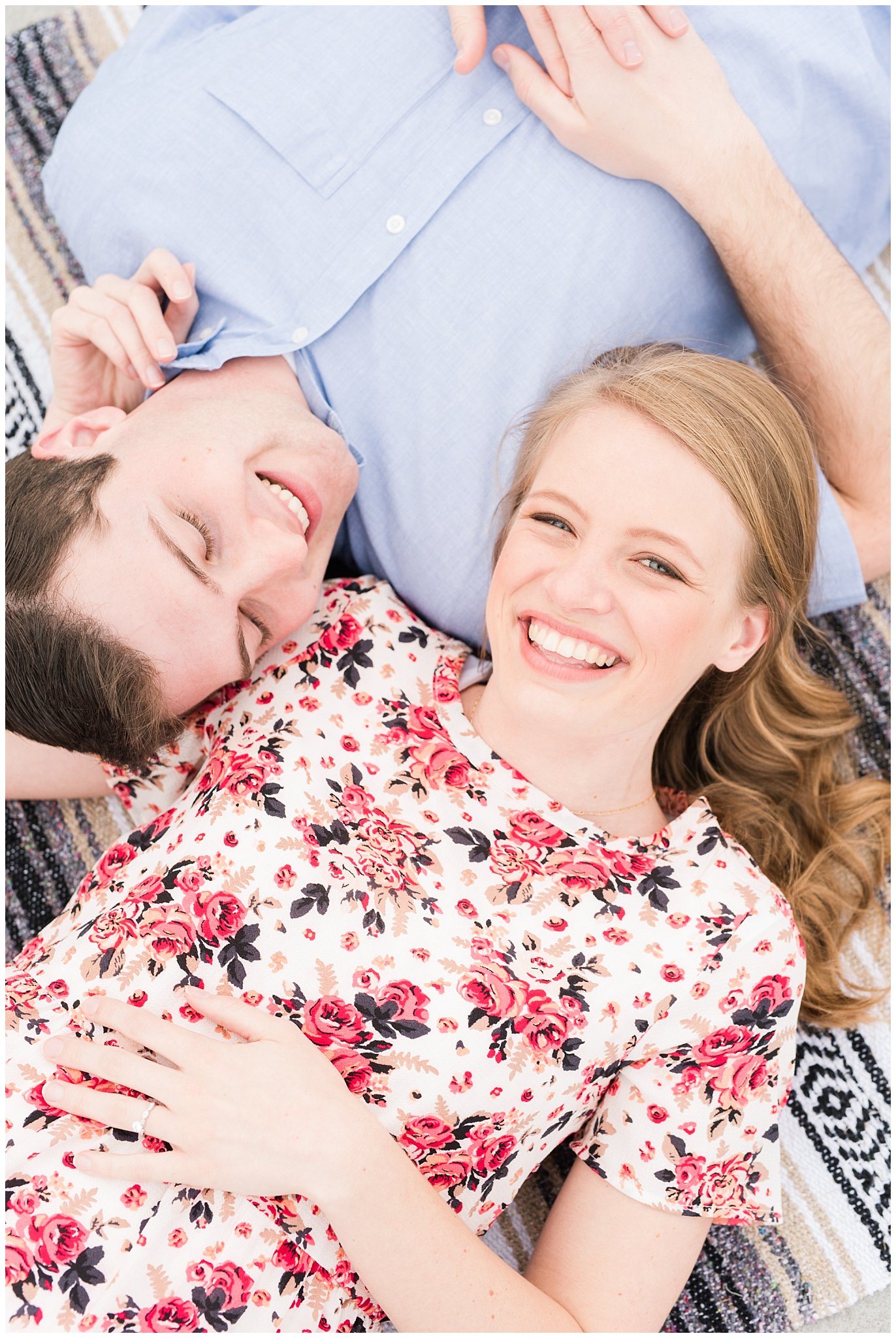 Couple laying down on blanket on a rooftop during engagement session | Top Utah Wedding and Couples Photos 2019 | Jessie and Dallin Photography