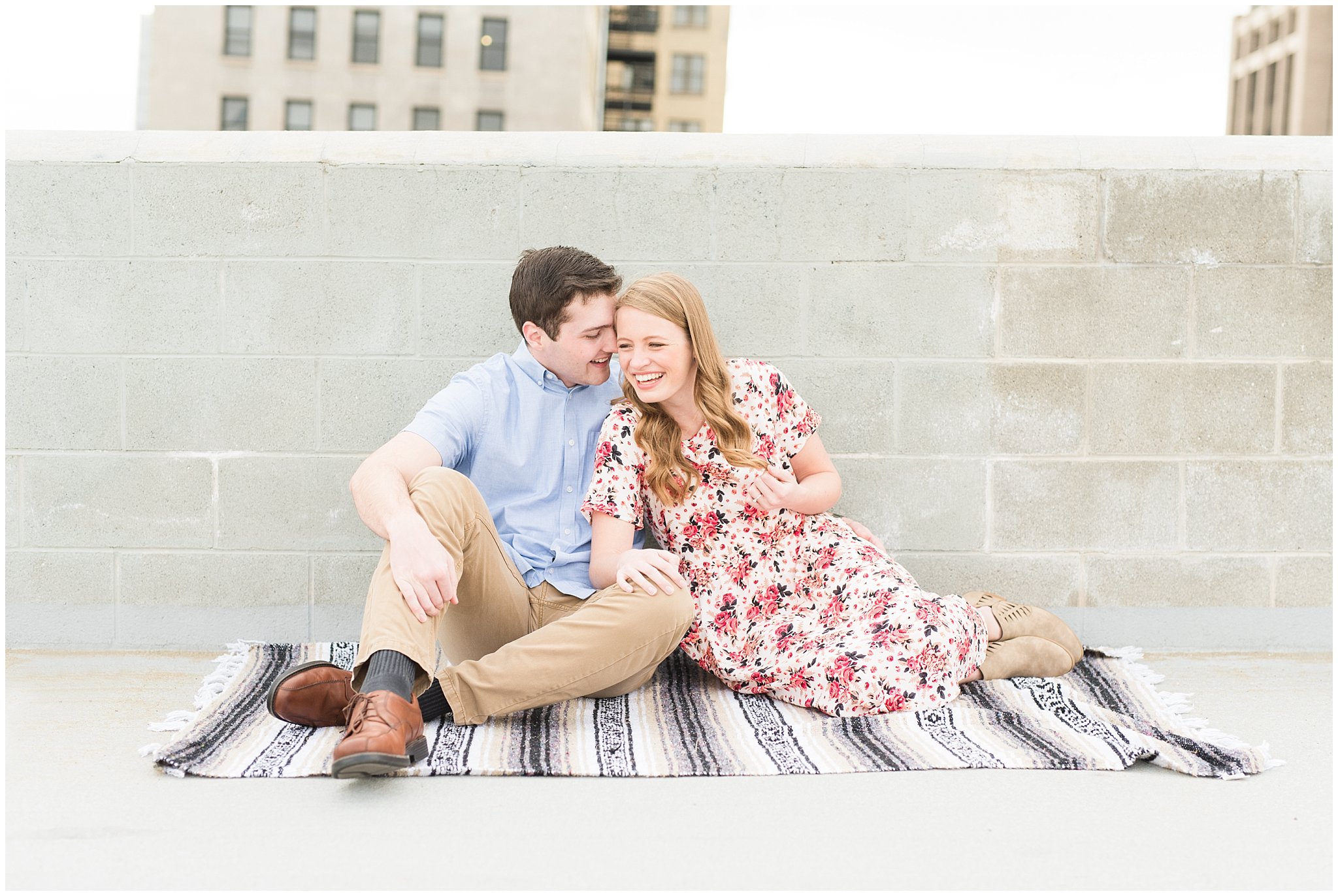 Couple on top of parking garage in Salt Lake City during engagement session | Top Utah Wedding and Couples Photos 2019 | Jessie and Dallin Photography
