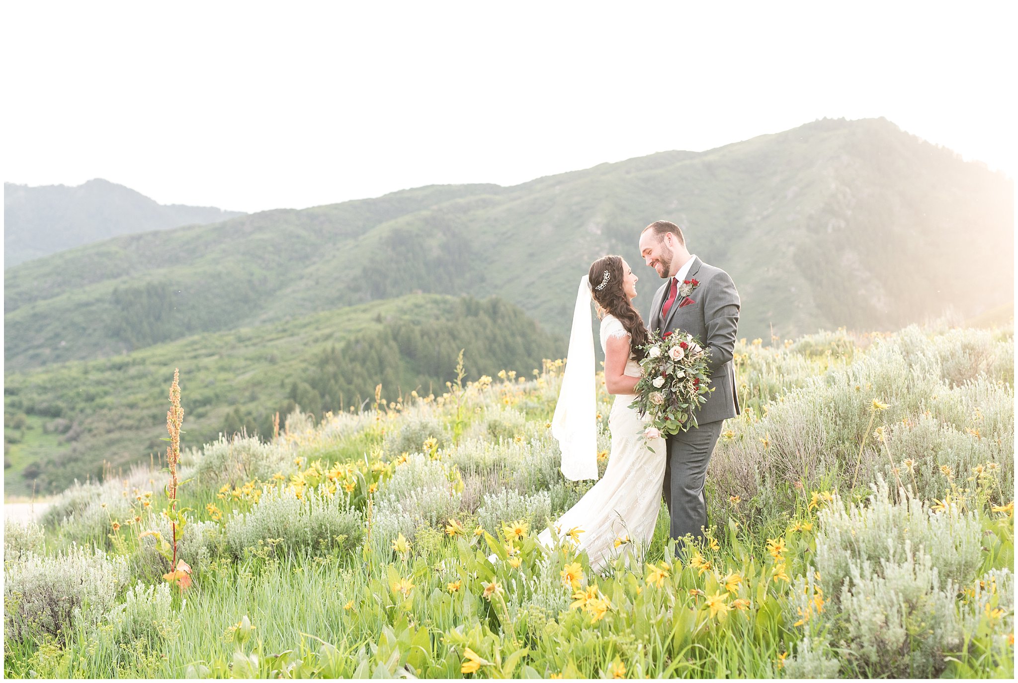Bride and groom on top of Utah mountains in wildflowers | Top Utah Wedding and Couples Photos 2019 | Jessie and Dallin Photography