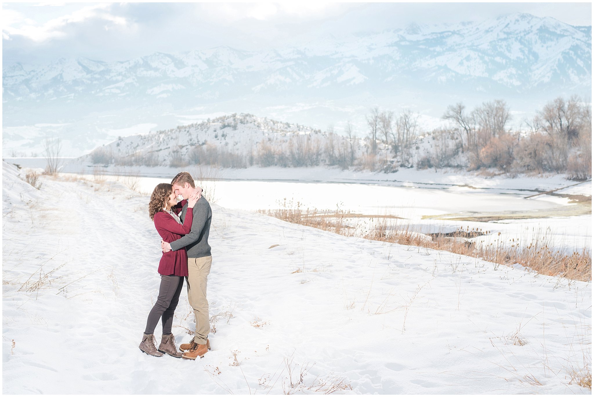 Couple in front of winter mountains and lake during engagement session| Top Utah Wedding and Couples Photos 2019 | Jessie and Dallin Photography