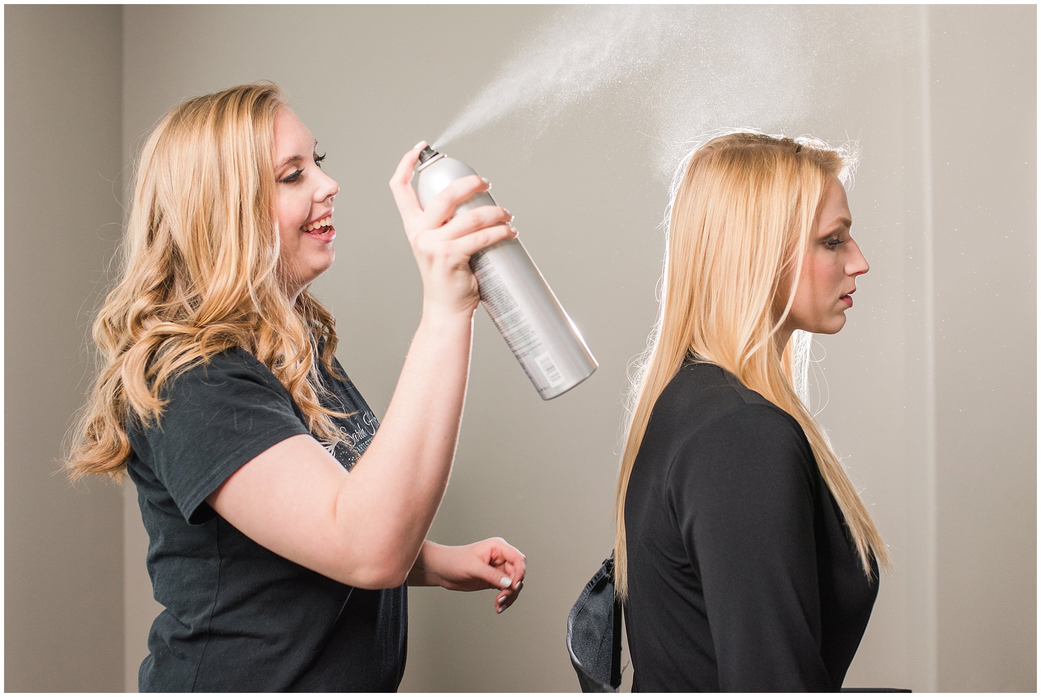 Sarah Hicken finishing hair with hairspray | Utah Wedding Hair and Makeup Artist | Sarah Hicken | Jessie and Dallin Photography
