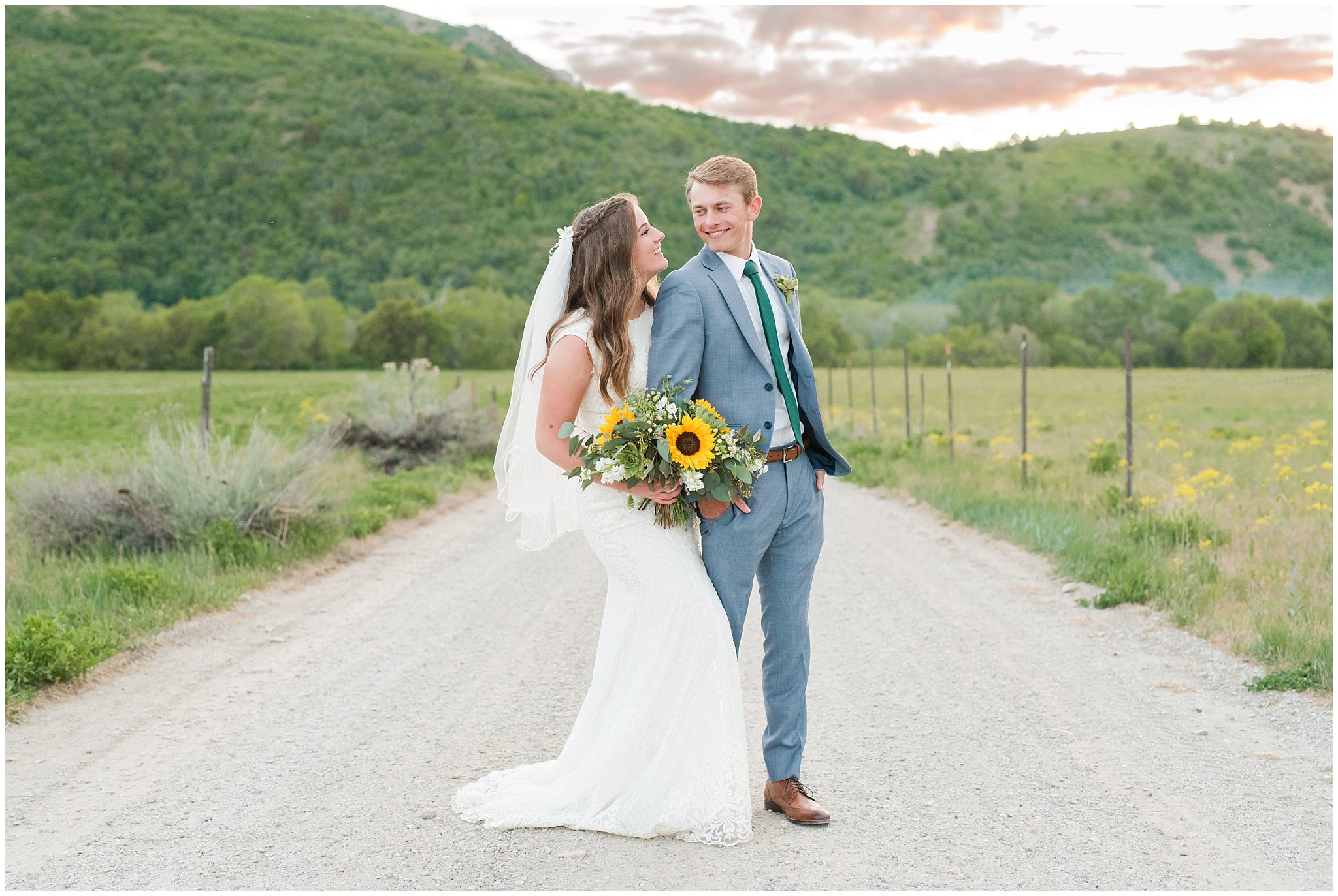 Bride with sunflower and succulent bouquet and groom in light blue suit in the mountains in Sardine Canyon Utah | Brigham City Temple and Mantua Mountain Formal Session | Jessie and Dallin Photography