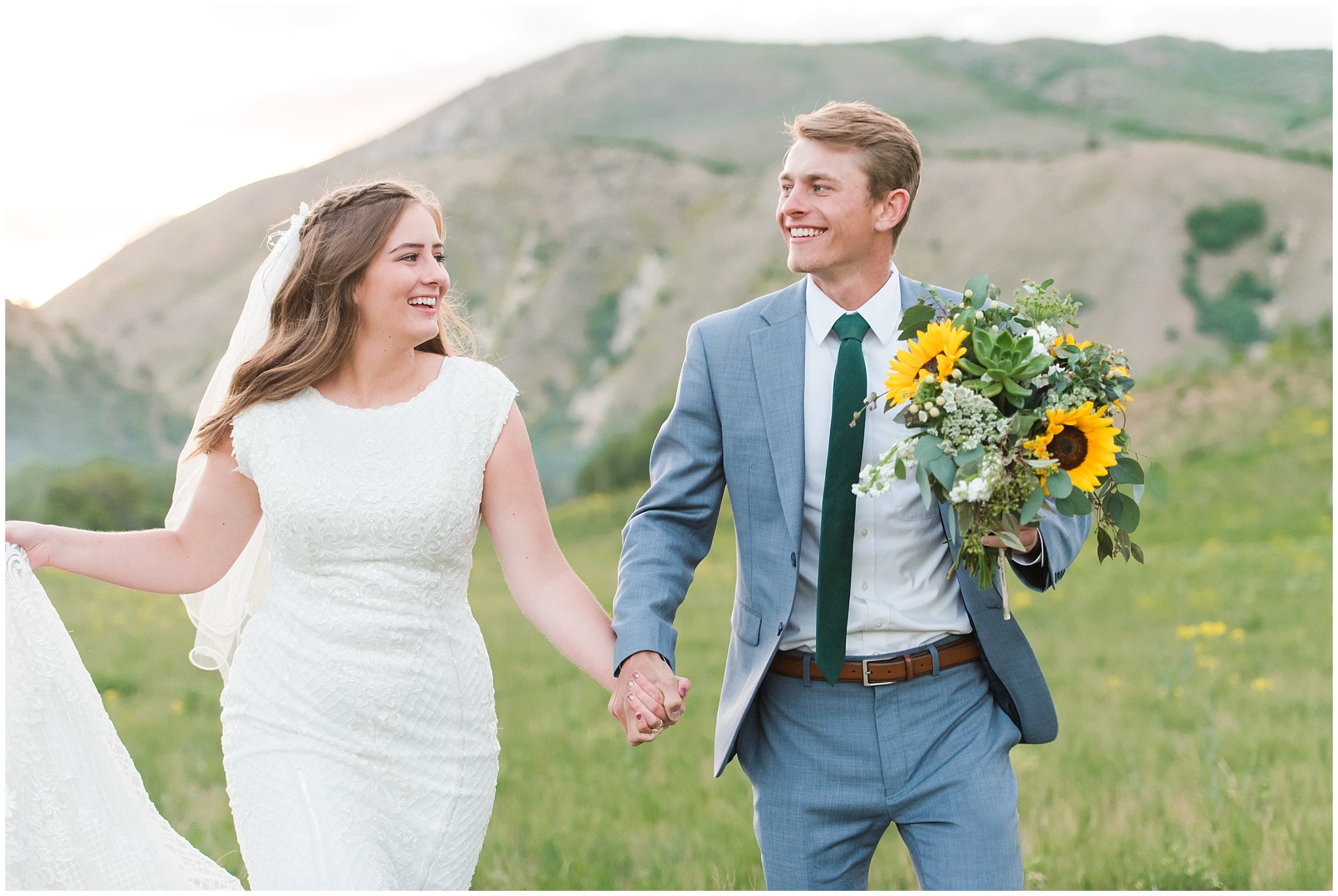 Bride with sunflower and succulent bouquet and groom in light blue suit in the mountains in Sardine Canyon Utah | Brigham City Temple and Mantua Mountain Formal Session | Jessie and Dallin Photography