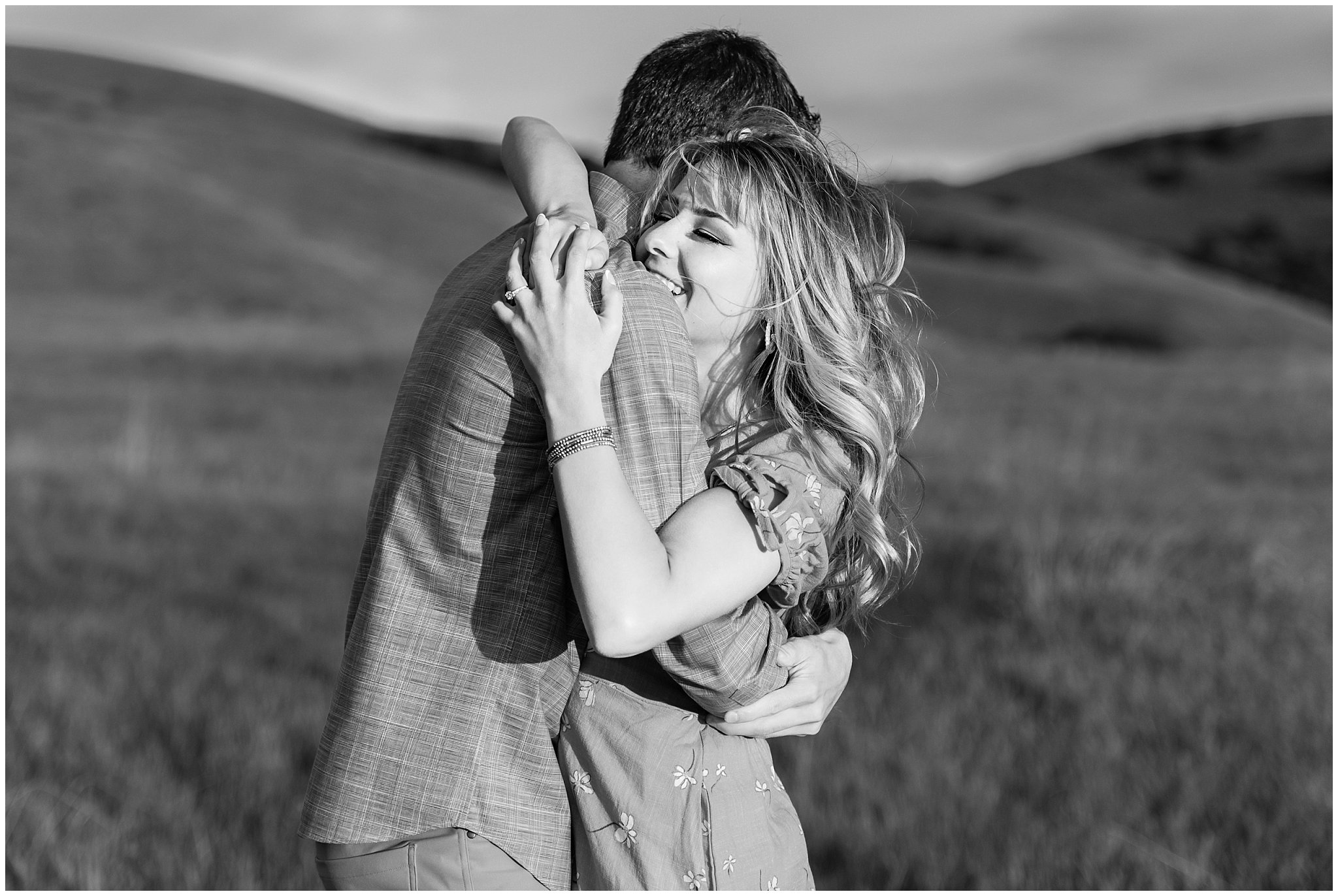 Couple in yellow dress and blue button up shirt on a grassy mountainside at Tunnel Springs | Utah State Capitol and Tunnel Springs Engagement Session | Jessie and Dallin Photography