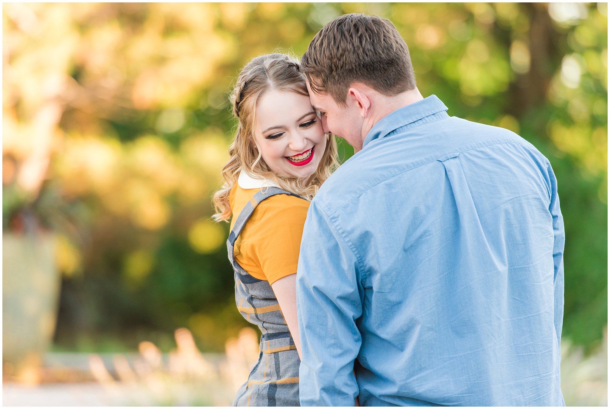 Couple dressed in yellow and blue for garden engagement session | Summer USU Botanical Garden Engagement Session | Jessie and Dallin Photography