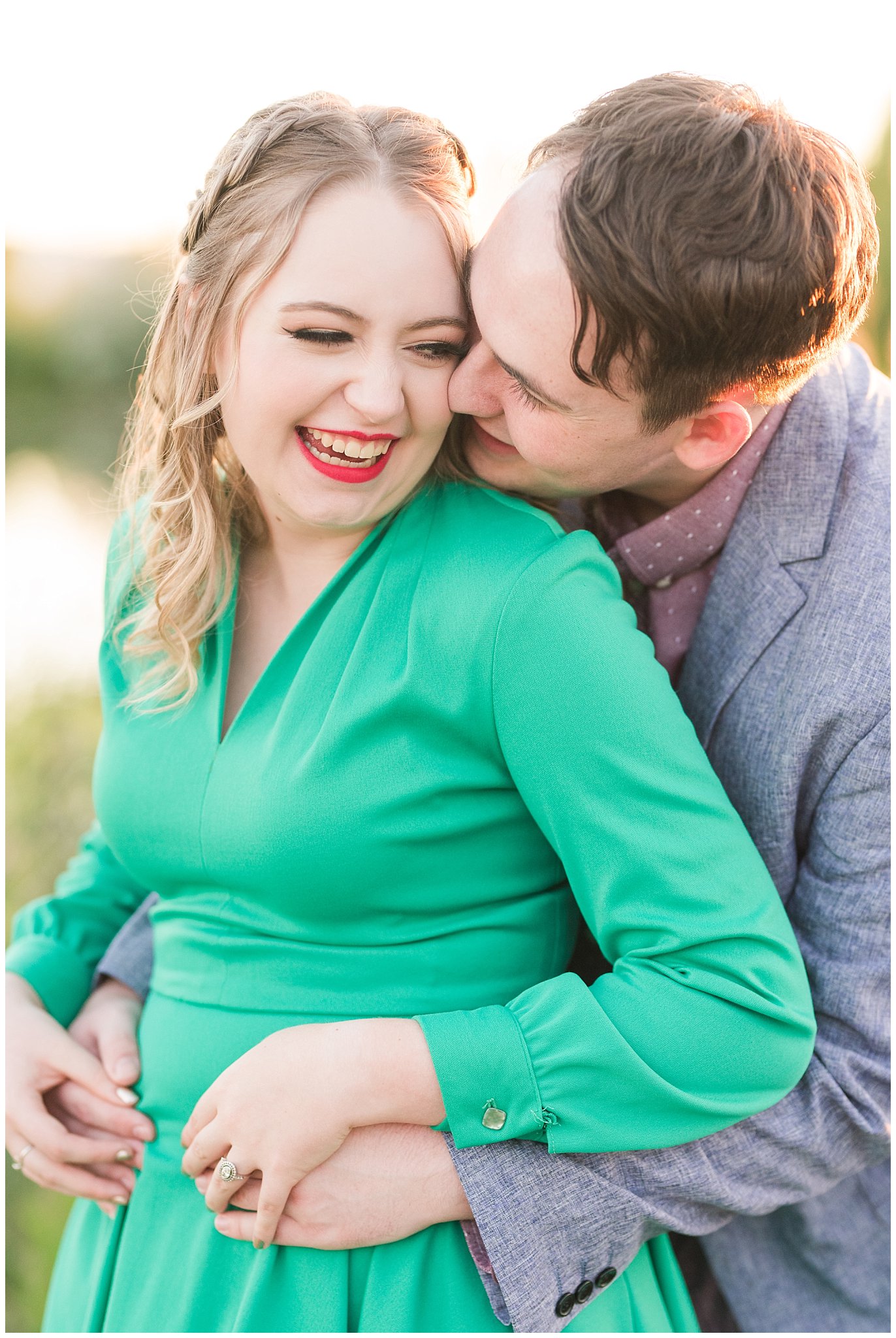 Couple in a garden for their engagement session with a vintage 1950s dress | Summer USU Botanical Garden Engagement Session | Jessie and Dallin Photography