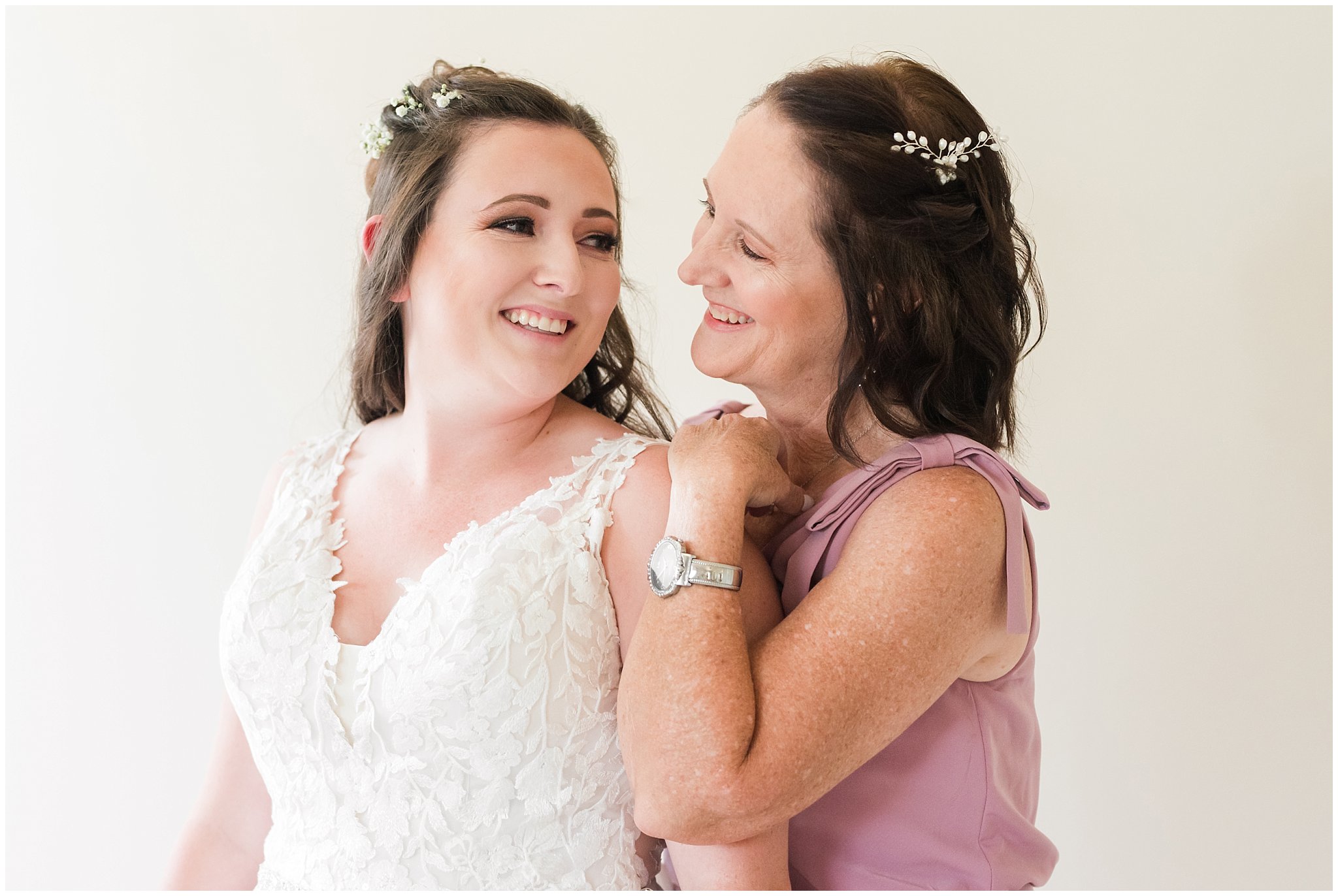 Bride and mom share moment getting ready | Oak Hills Utah Dusty Rose and Gray Summer Wedding | Jessie and Dallin Photography