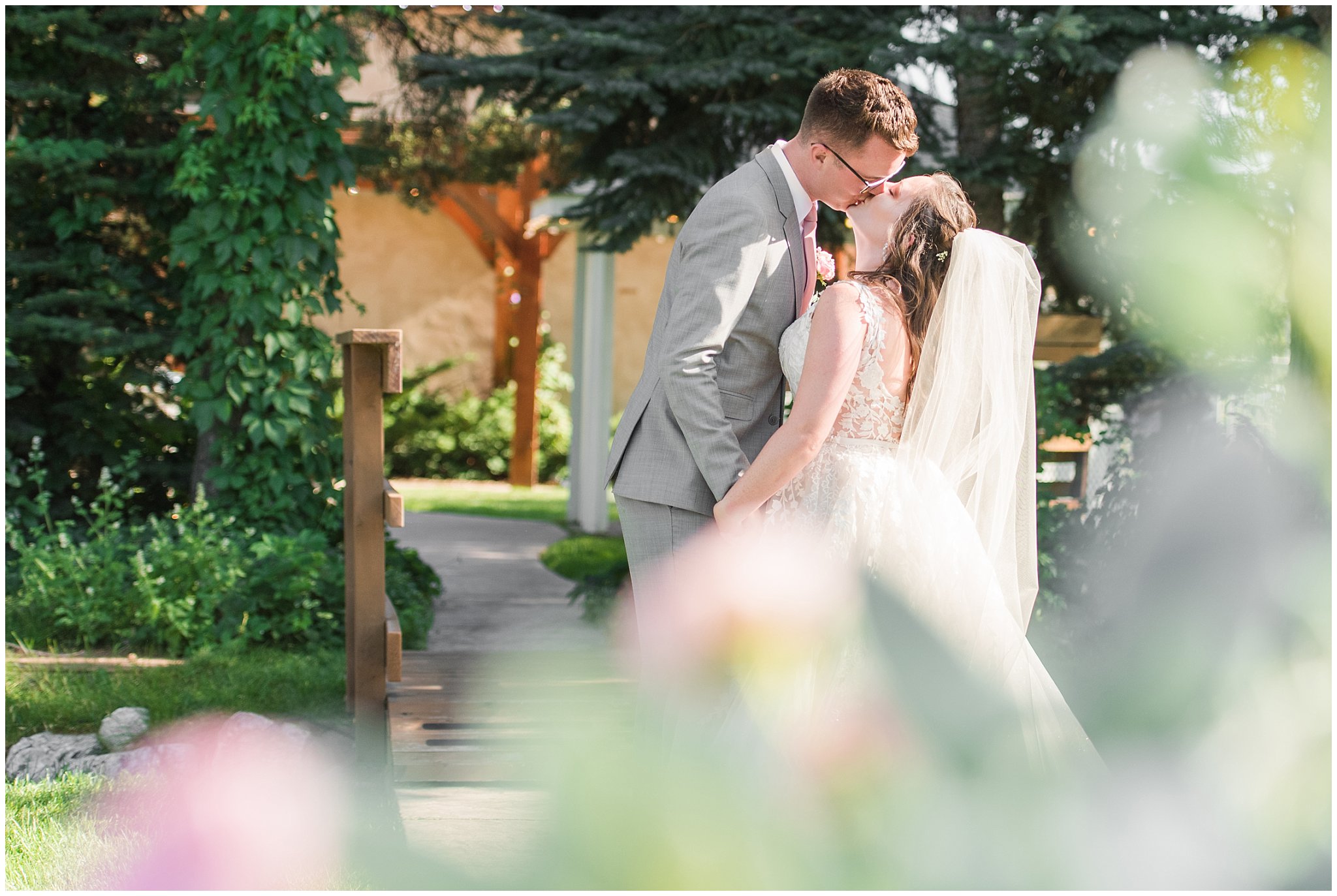 Bride and groom kiss after ceremony | Oak Hills Utah Dusty Rose and Gray Summer Wedding | Jessie and Dallin Photography