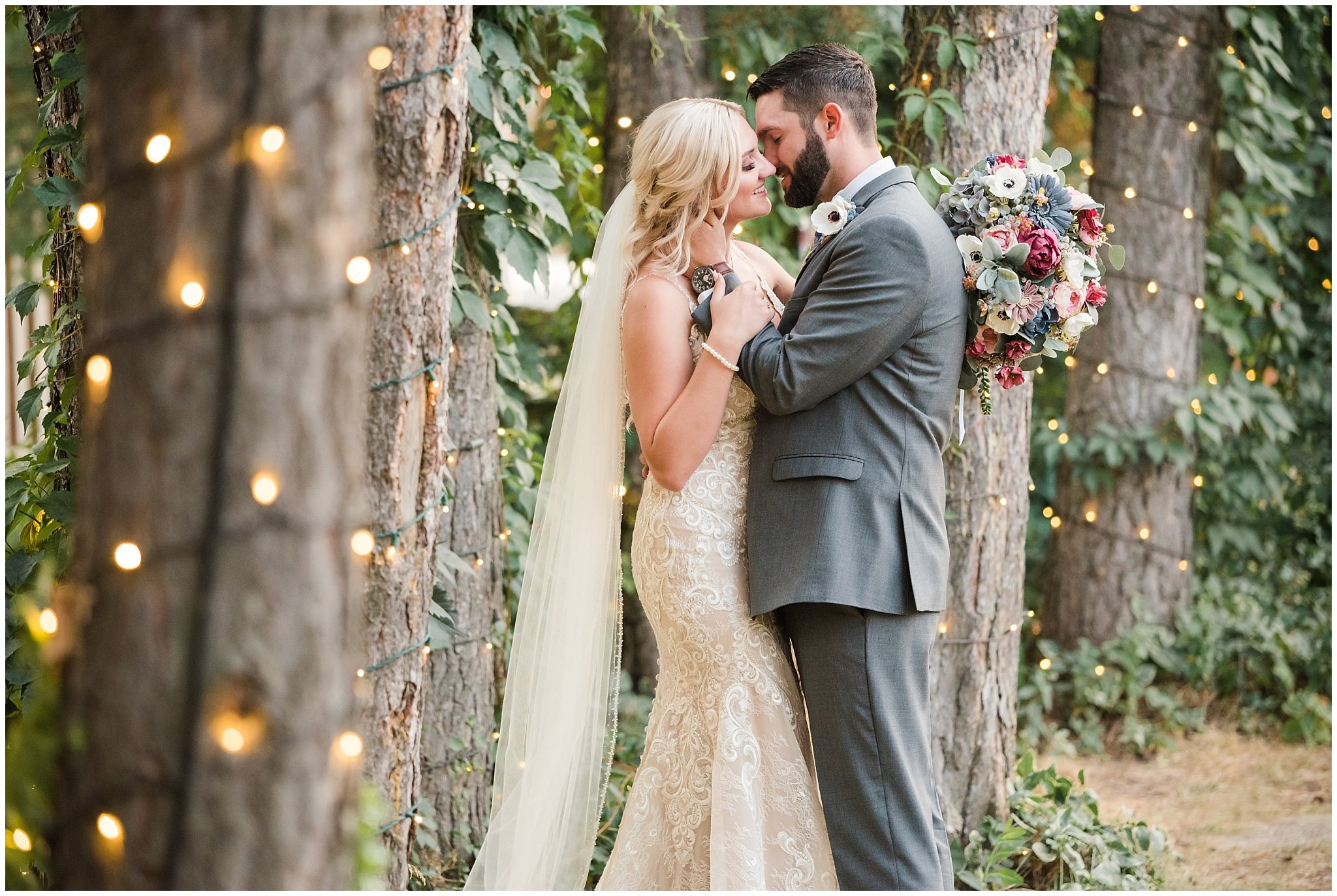 Bride and groom portraits with lace dress and cathedral veil and gray suit with blue floral tie | Dusty Blue and Rose Summer Wedding at Oak Hills Utah | Jessie and Dallin Photography