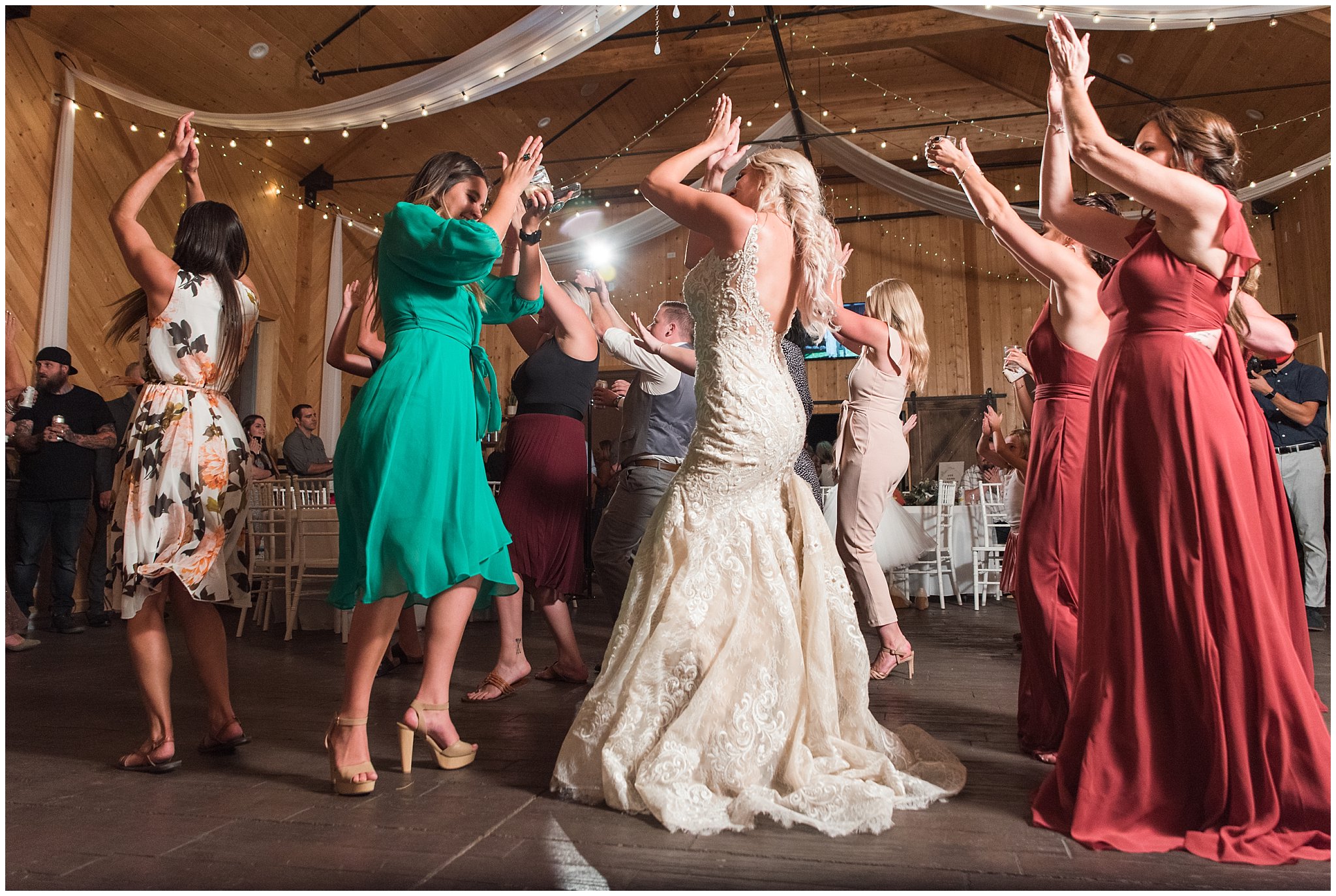 Wedding party dancing and celebrating | Dusty Blue and Rose Summer Wedding at Oak Hills Utah | Jessie and Dallin Photography