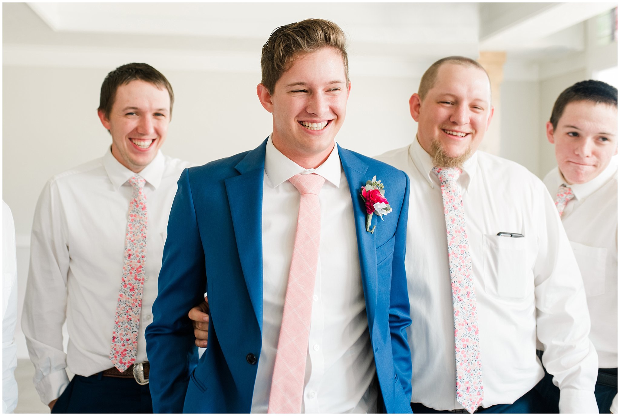 Groom and groomsmen in floral pink ties | Talia Event Center Summer Wedding | Jessie and Dallin Photography