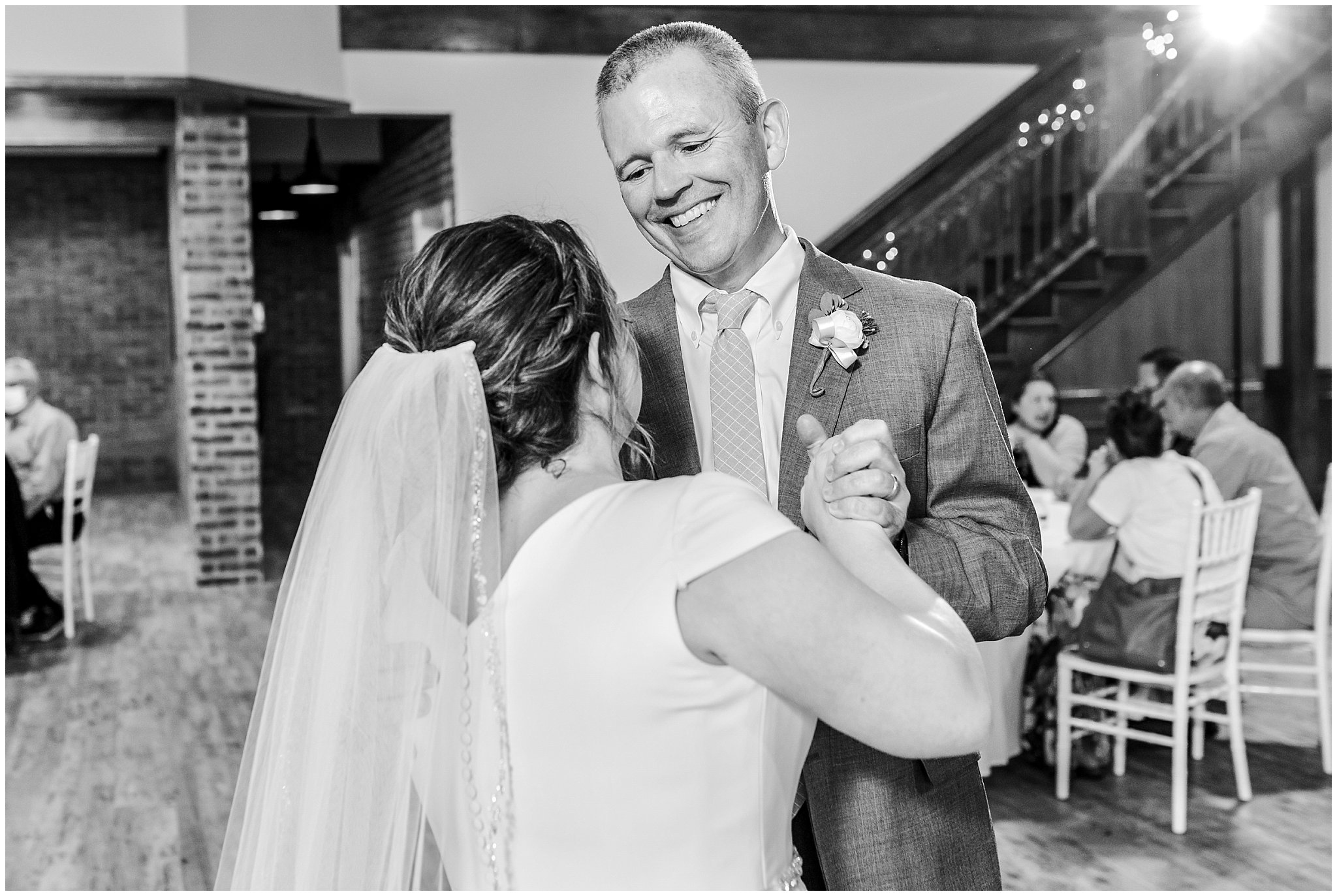 Father daughter dance underneath chandelier | Talia Event Center Summer Wedding | Jessie and Dallin Photography