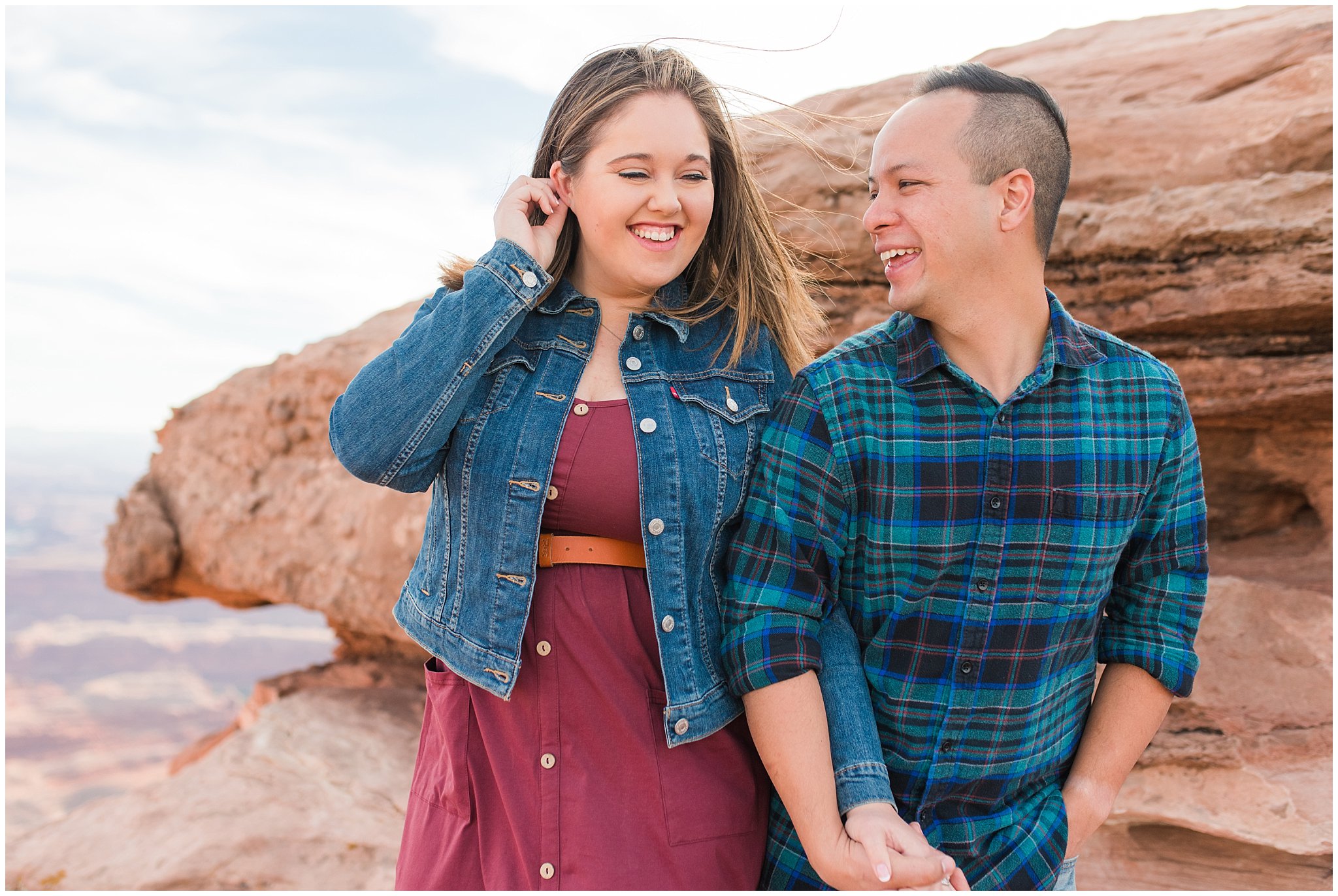 Couple in casual dress during engagement session at Dead Horse Point | Arches National Park and Dead Horse Point Engagement | Jessie and Dallin Photography