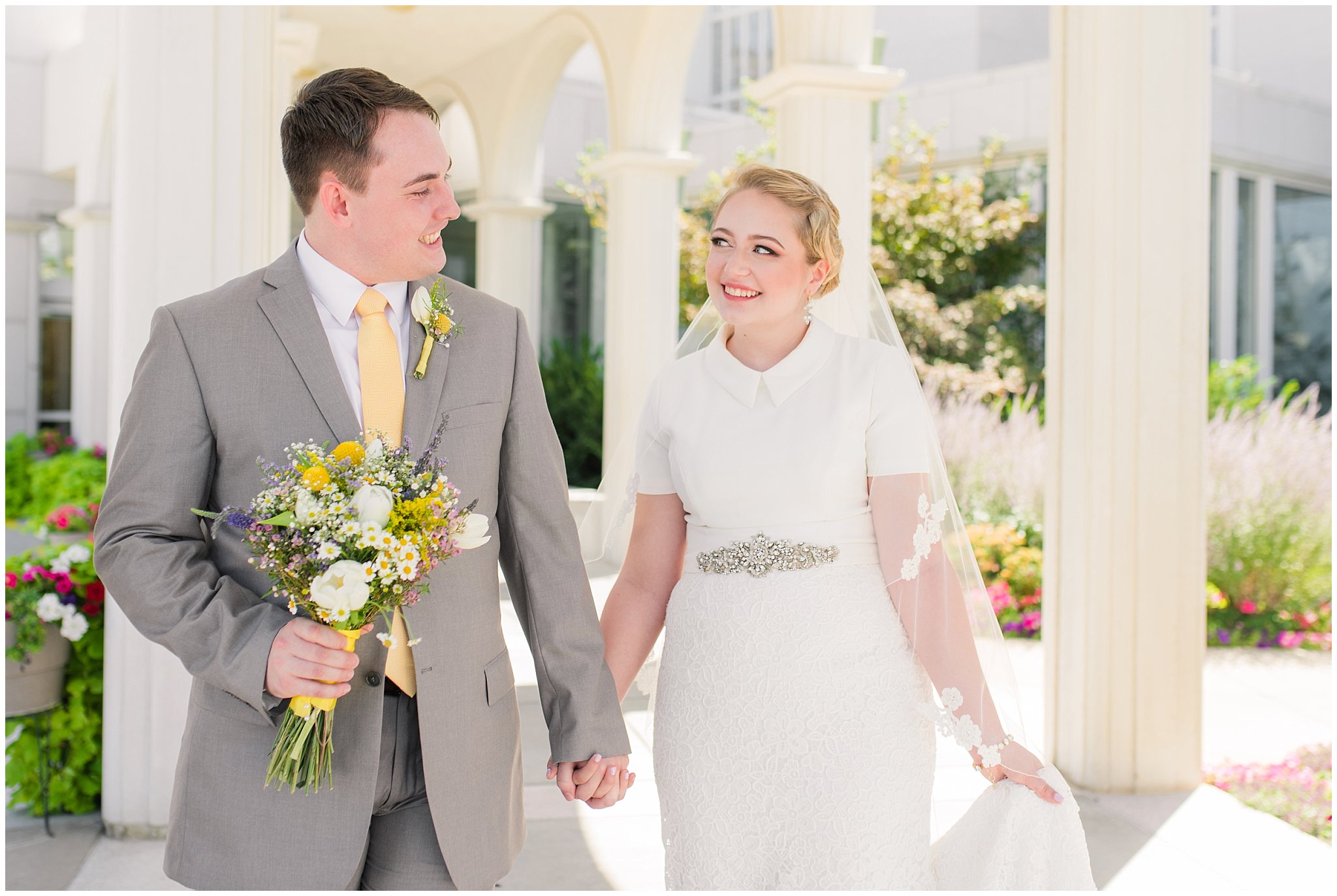 Bride and groom vintage wedding portraits at the Bountiful Temple in the summer with wildflower bouquet | Fountain View Event Venue and Bountiful Temple Wedding | Jessie and Dallin Photography