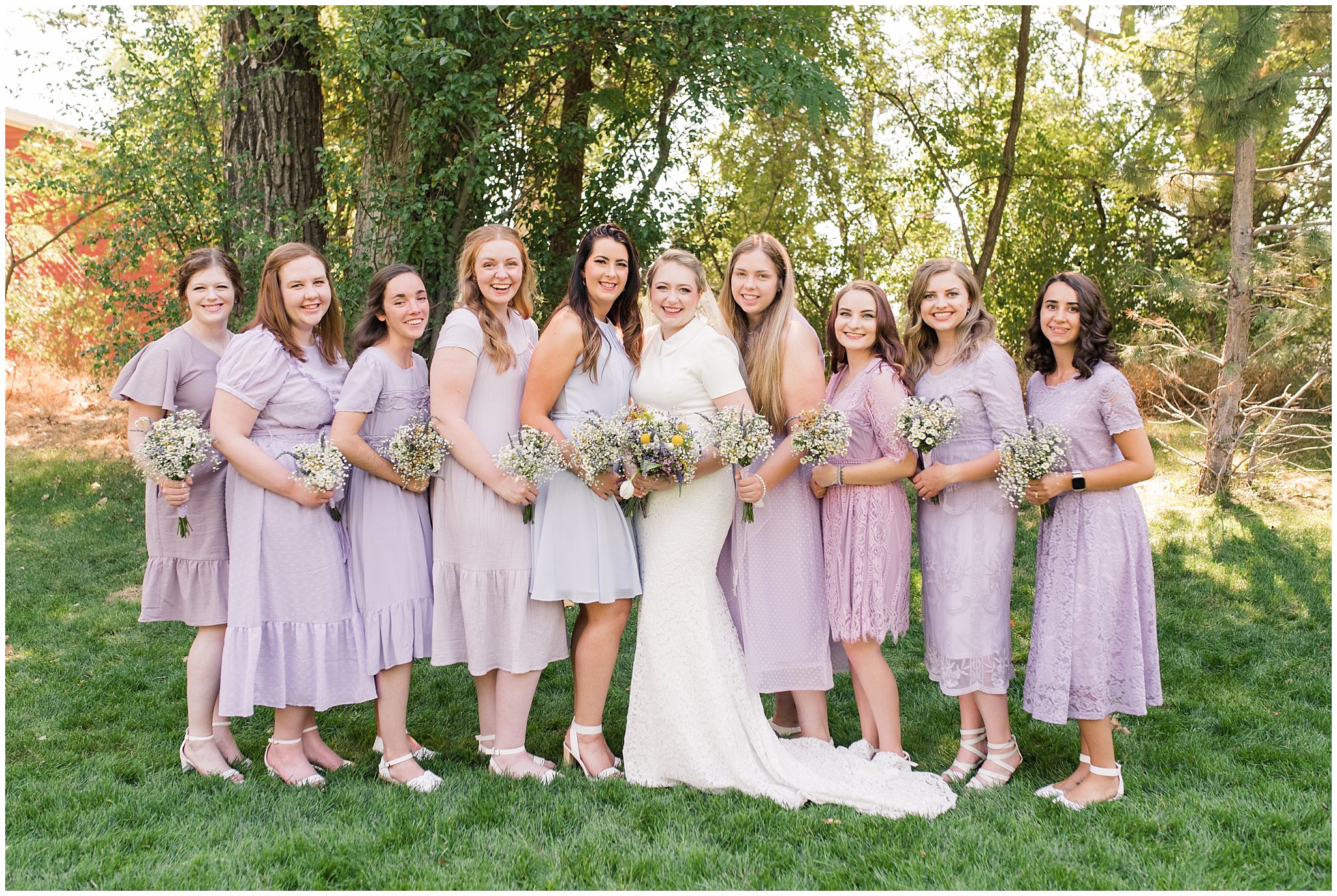 Wedding party in lavender dresses and yellow ties with wildflowers | Fountain View Event Venue and Bountiful Temple Wedding | Jessie and Dallin Photography