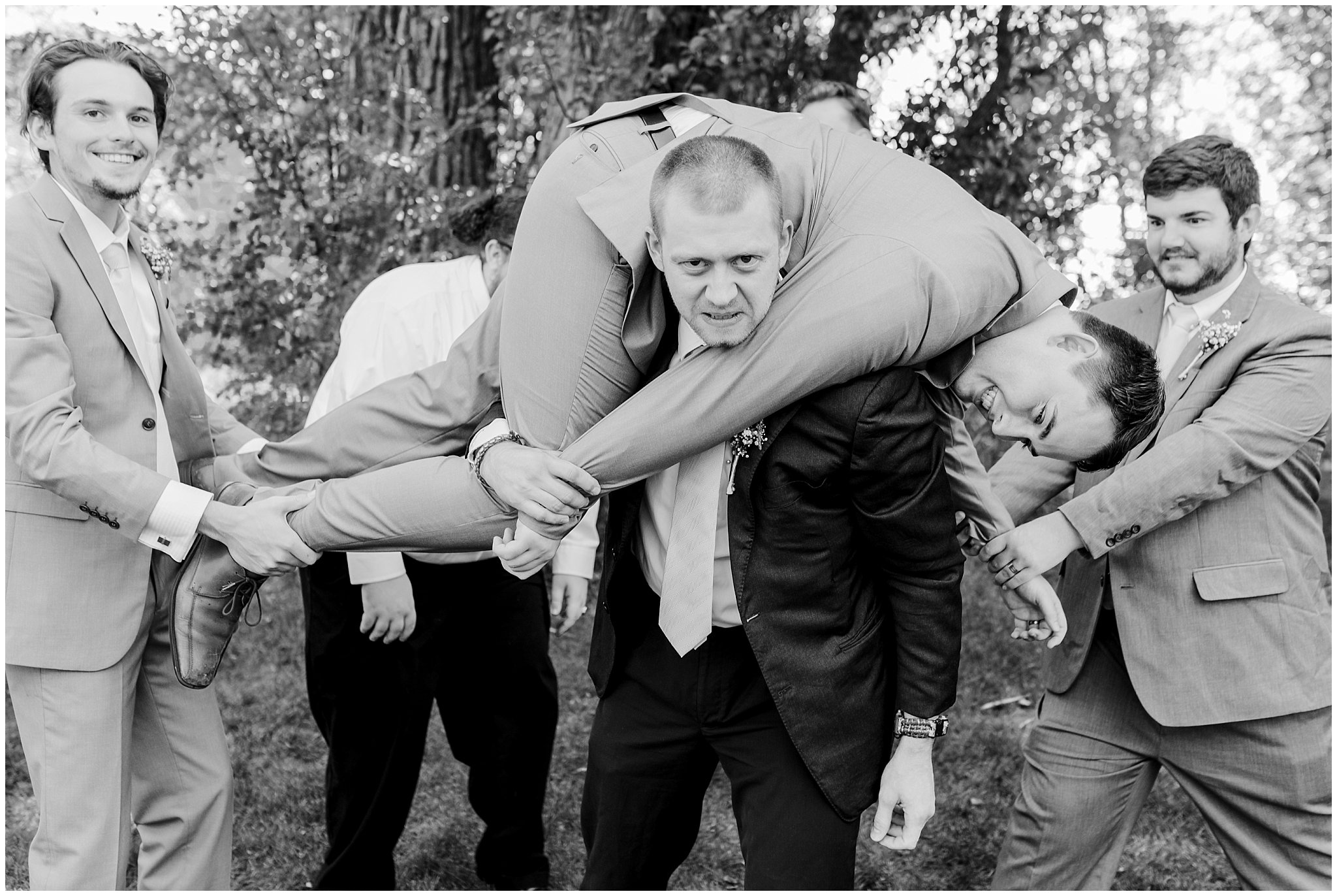 Groomsmen with fireman carry | Fountain View Event Venue and Bountiful Temple Wedding | Jessie and Dallin Photography
