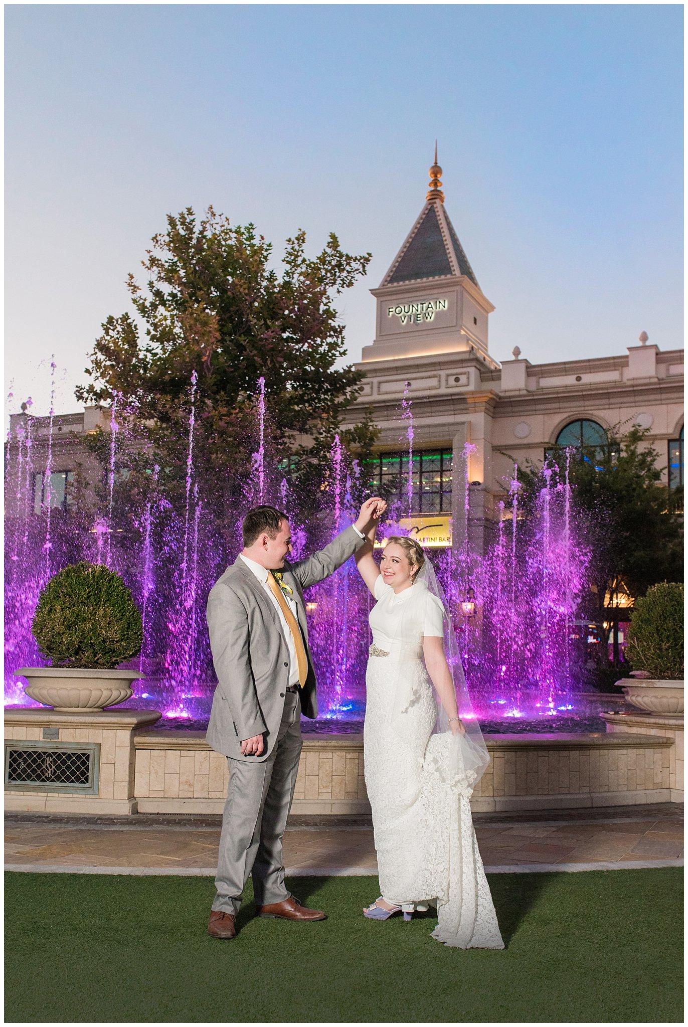 Outdoor fountain bride and groom portraits at night with fountains at Fountain View Event Venue at Station Park | Fountain View Event Venue and Bountiful Temple Wedding | Jessie and Dallin Photography