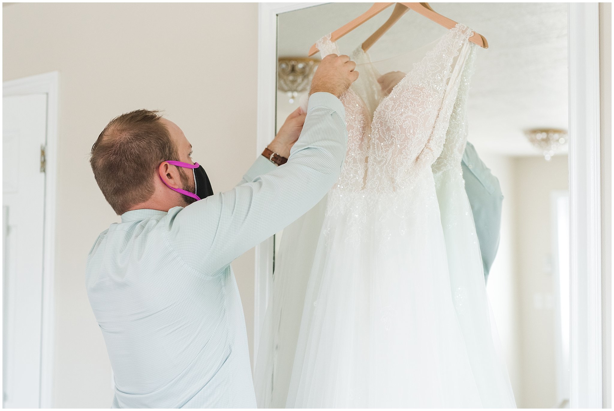 Dallin fixing wedding dress and tossing veils