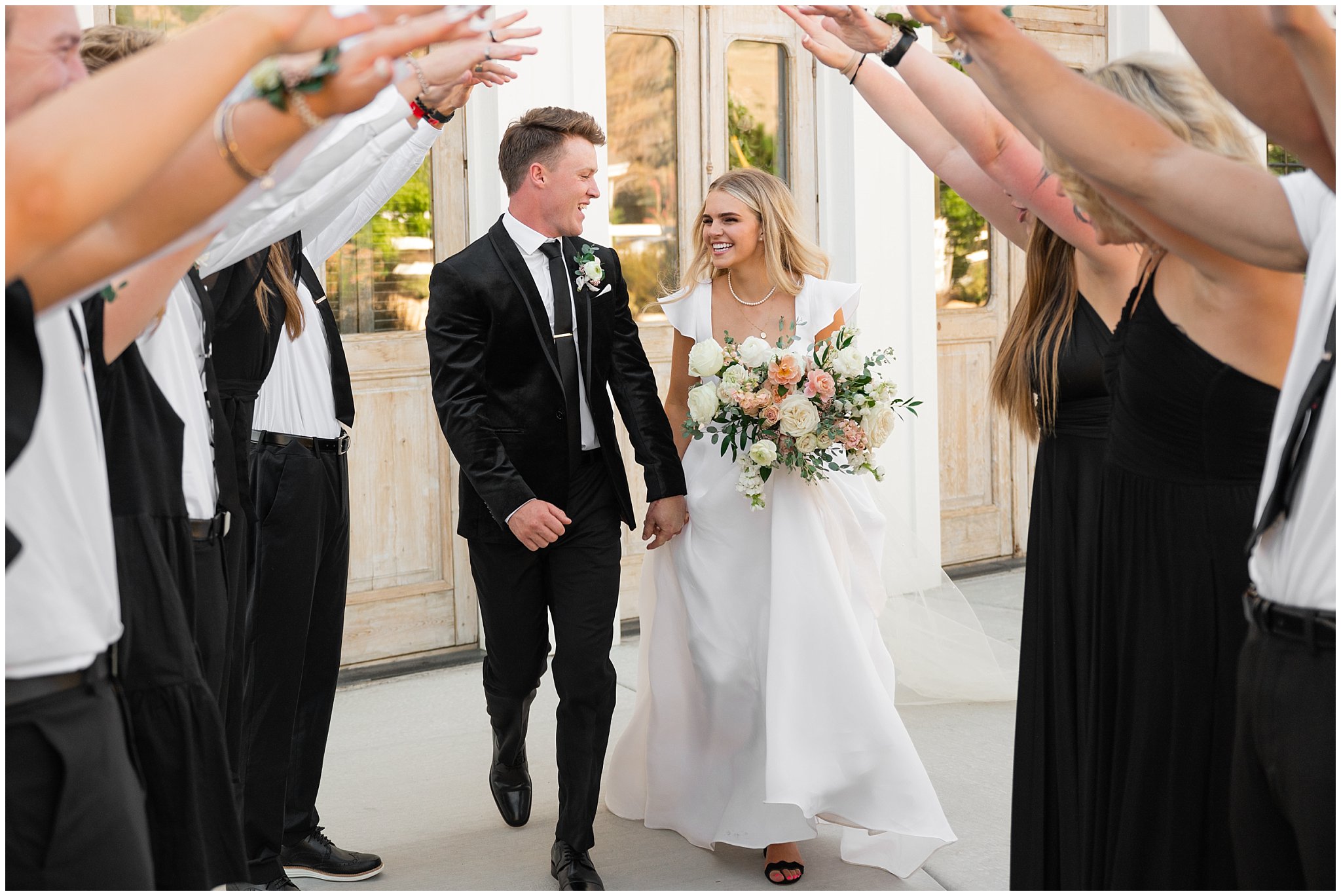 Wedding party portraits wearing black and white