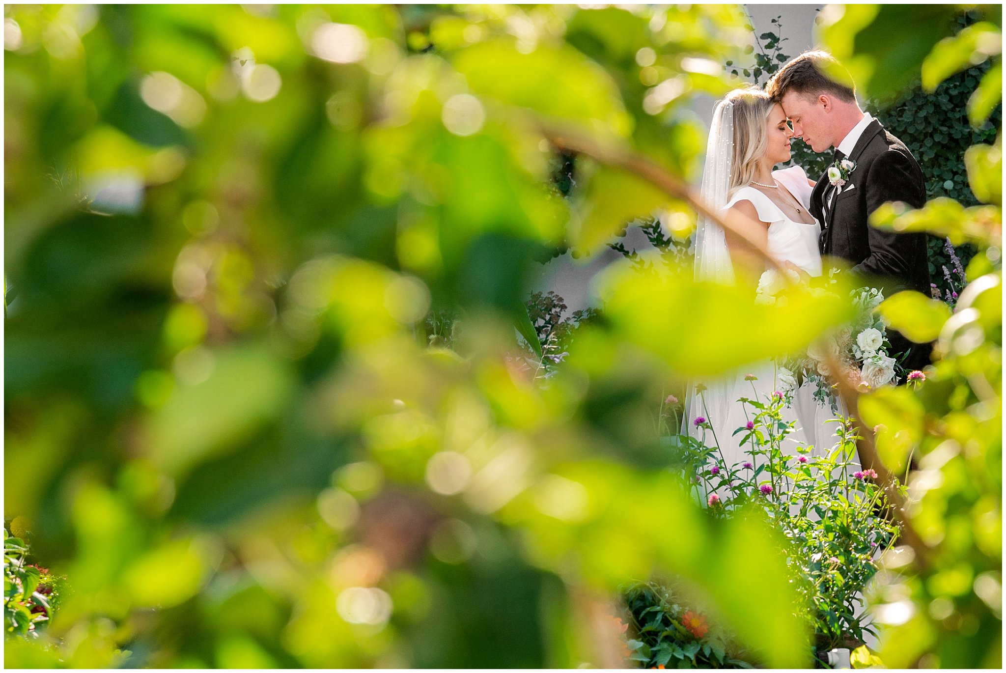 Couple's portraits outside in the gardens at Walker Farms