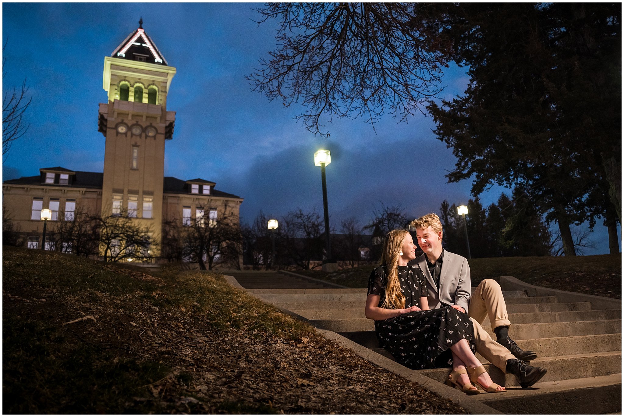 Couple near Old Main at sunset at Utah State University for their engagement photos in Logan, Utah | Cache Valley and Utah State University Engagement Session | Jessie and Dallin Photography