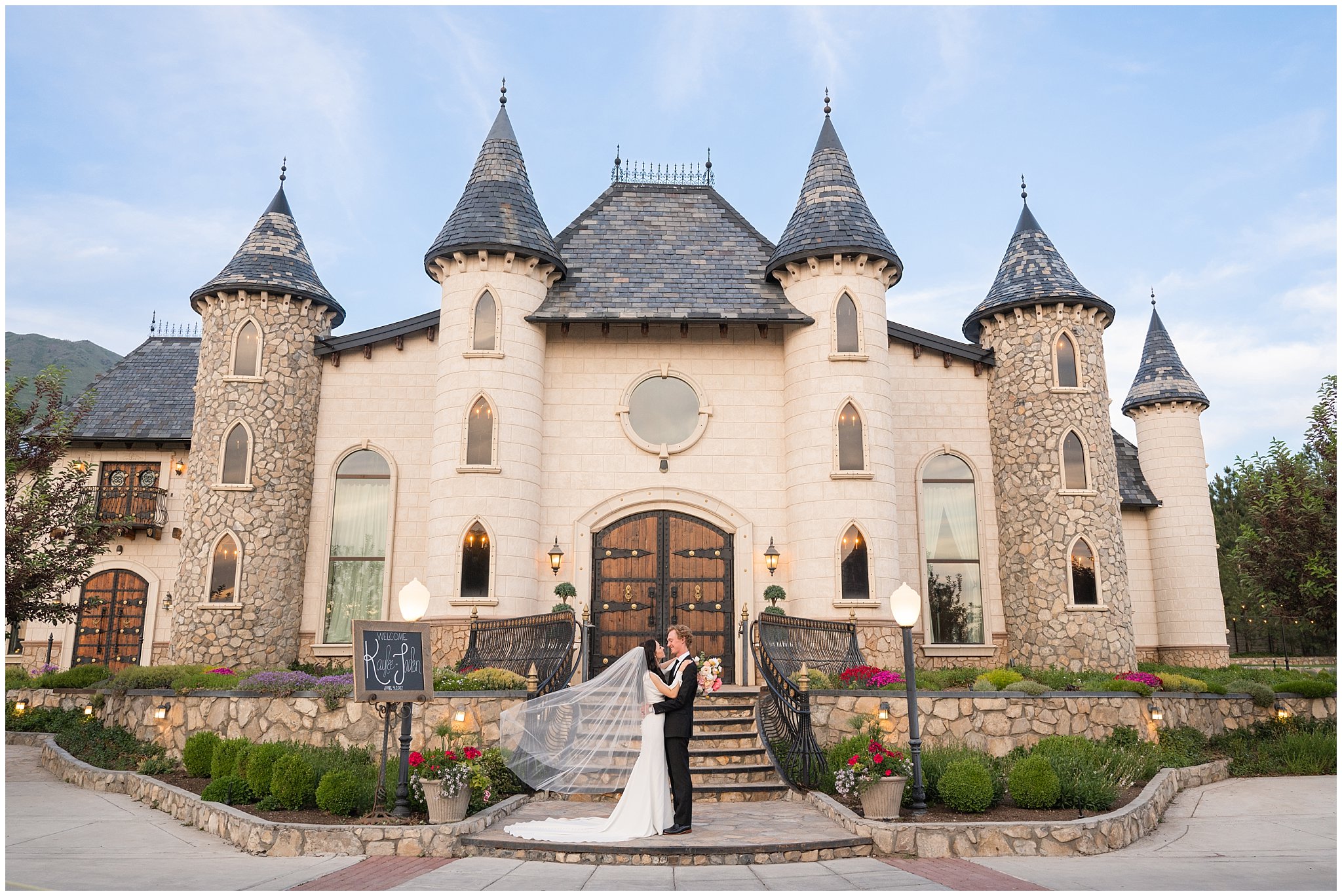 Bride and groom portraits outside of castle wedding venue with black and white and pink wedding colors | Draper Temple and Wadley Farms Summer Castle Wedding | Jessie and Dallin Photography