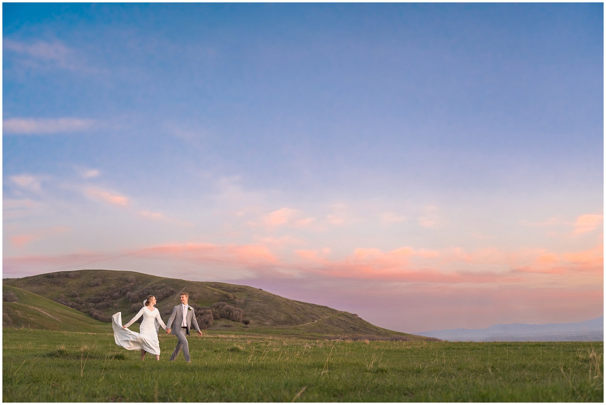 Bride and groom running on the top of a mountain at sunset | Bountiful Temple and Tunnel Springs Formal Session | Jessie and Dallin Photography