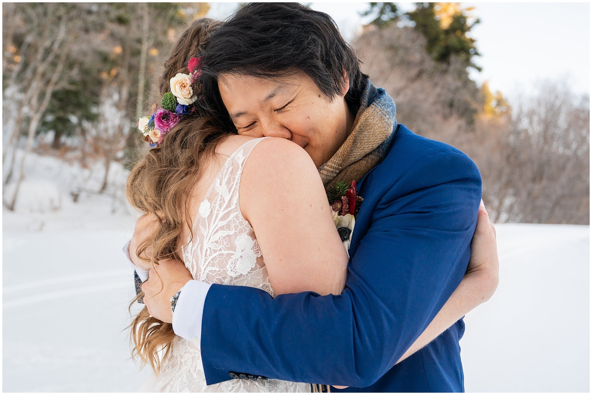 Bride and groom share a first look in the snow outside of Needles Lodge | Snowbasin Resort Winter Wedding | Jessie and Dallin Photography