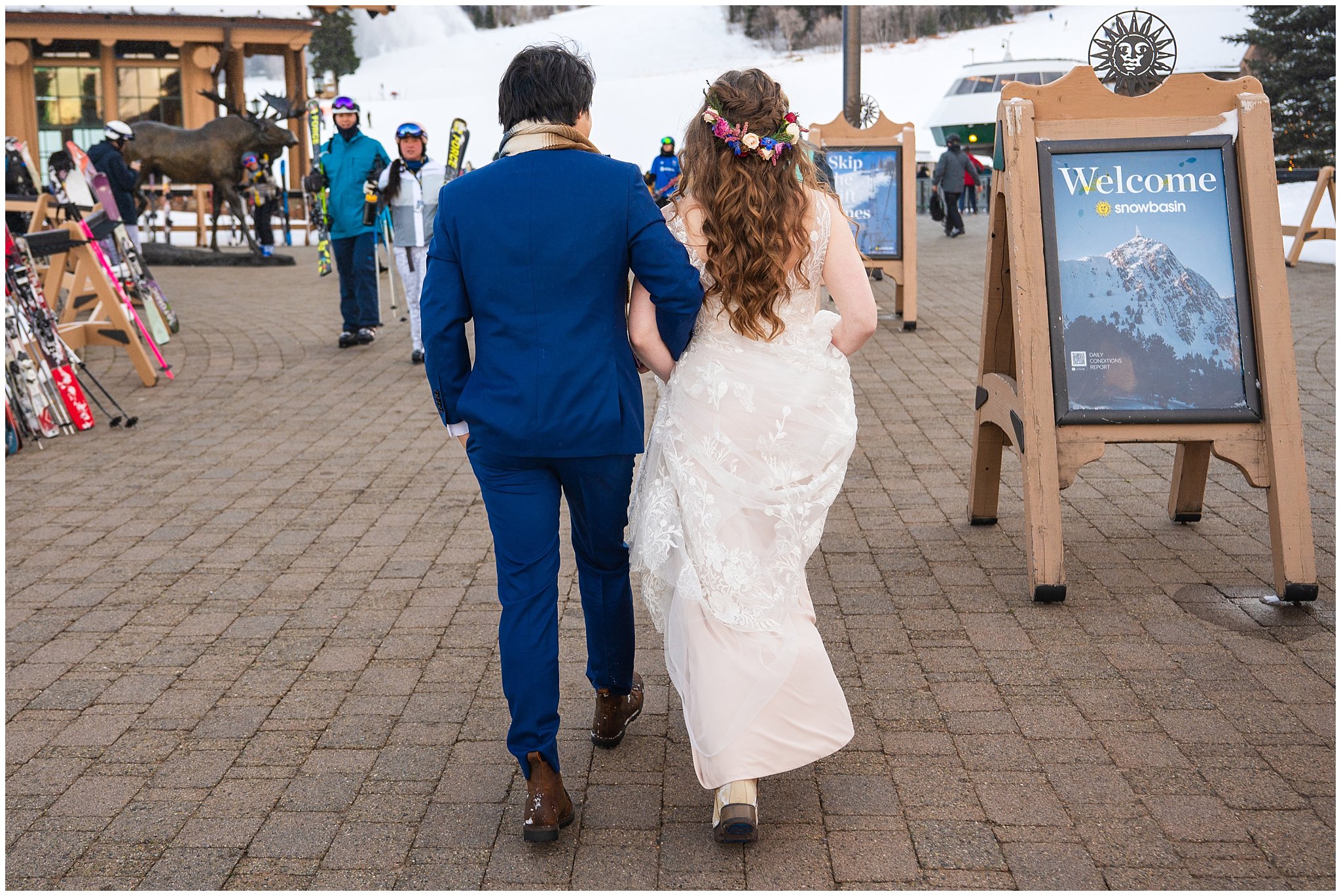 Bride and groom share a first look in the snow outside of Needles Lodge | Snowbasin Resort Winter Wedding | Jessie and Dallin Photography