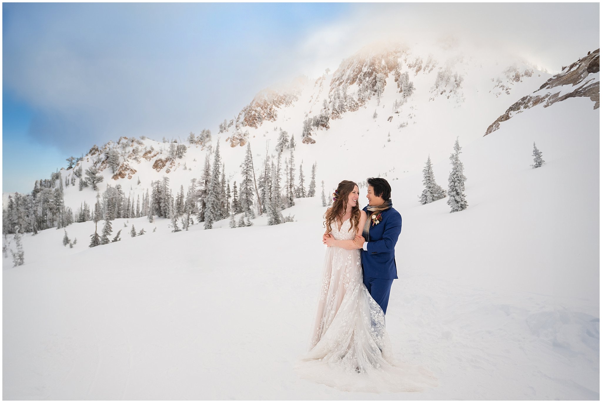 Bride and groom portraits in the snow at the top of Snowbasin | Snowbasin Resort Winter Wedding | Jessie and Dallin Photography