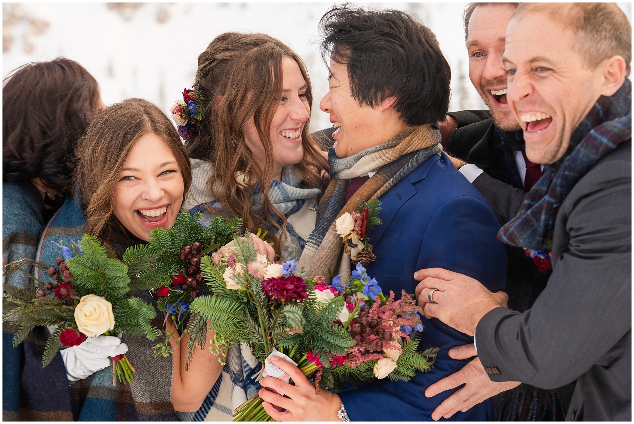 Wedding party portraits in the snow at the top of Snowbasin | Snowbasin Resort Winter Wedding | Jessie and Dallin Photography