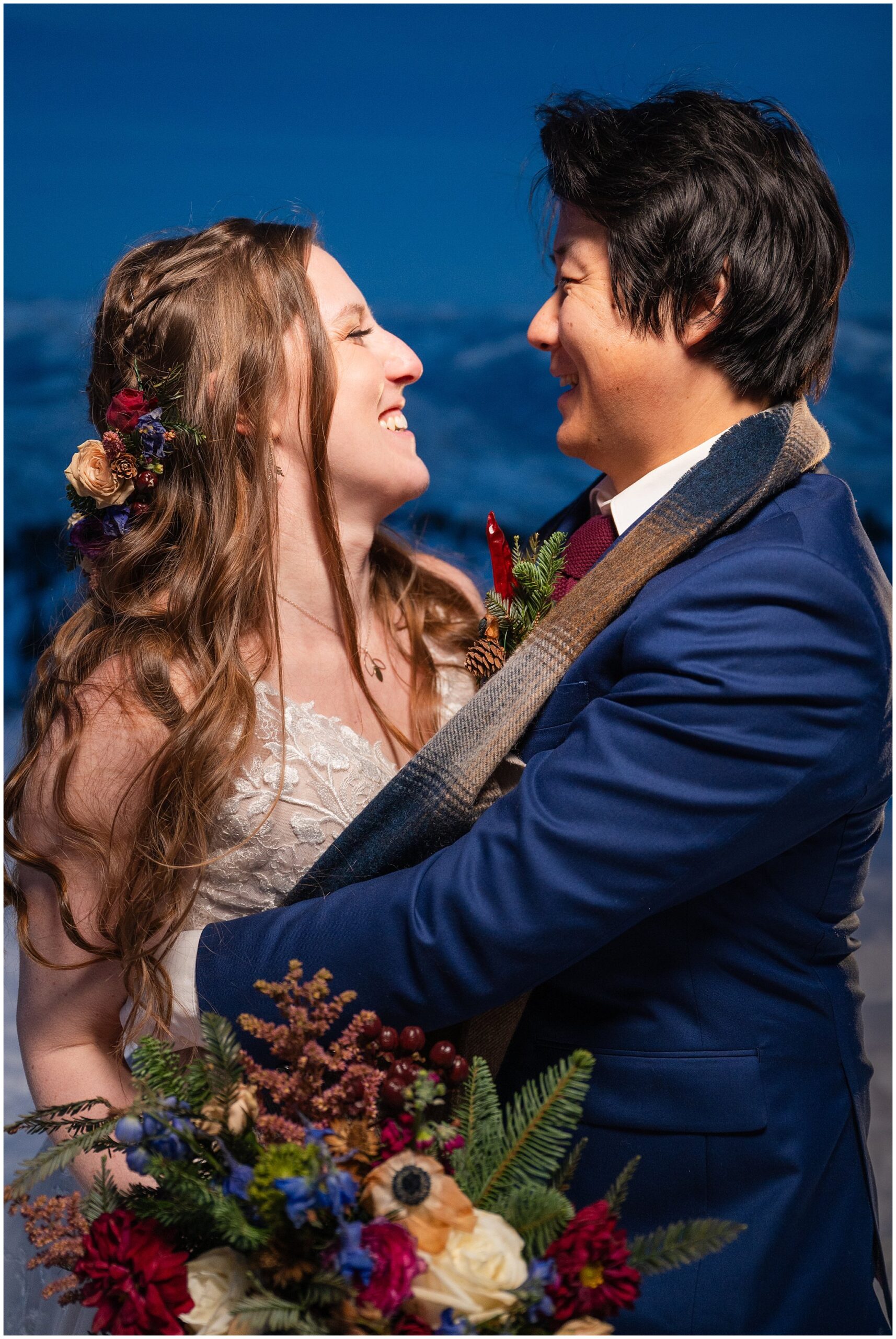 Bride and groom portraits during blue hour at the top of Snowbasin at Needles Lodge in the snow | Snowbasin Resort Winter Wedding | Jessie and Dallin Photography