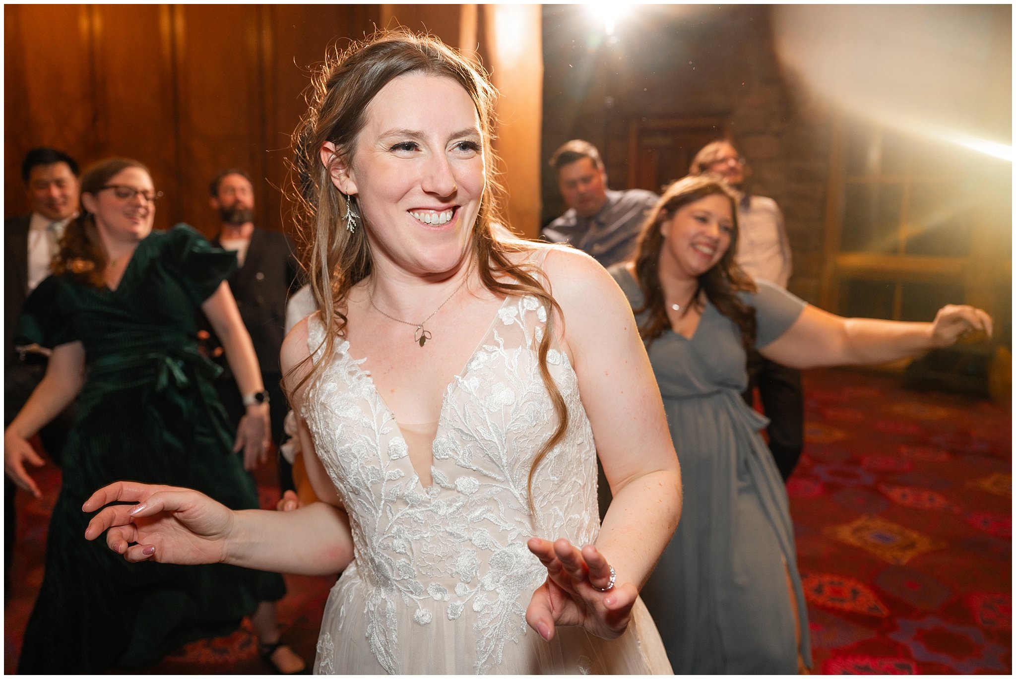 Dancing during reception inside Earl's Lodge for a winter wedding | Snowbasin Resort Winter Wedding | Jessie and Dallin Photography