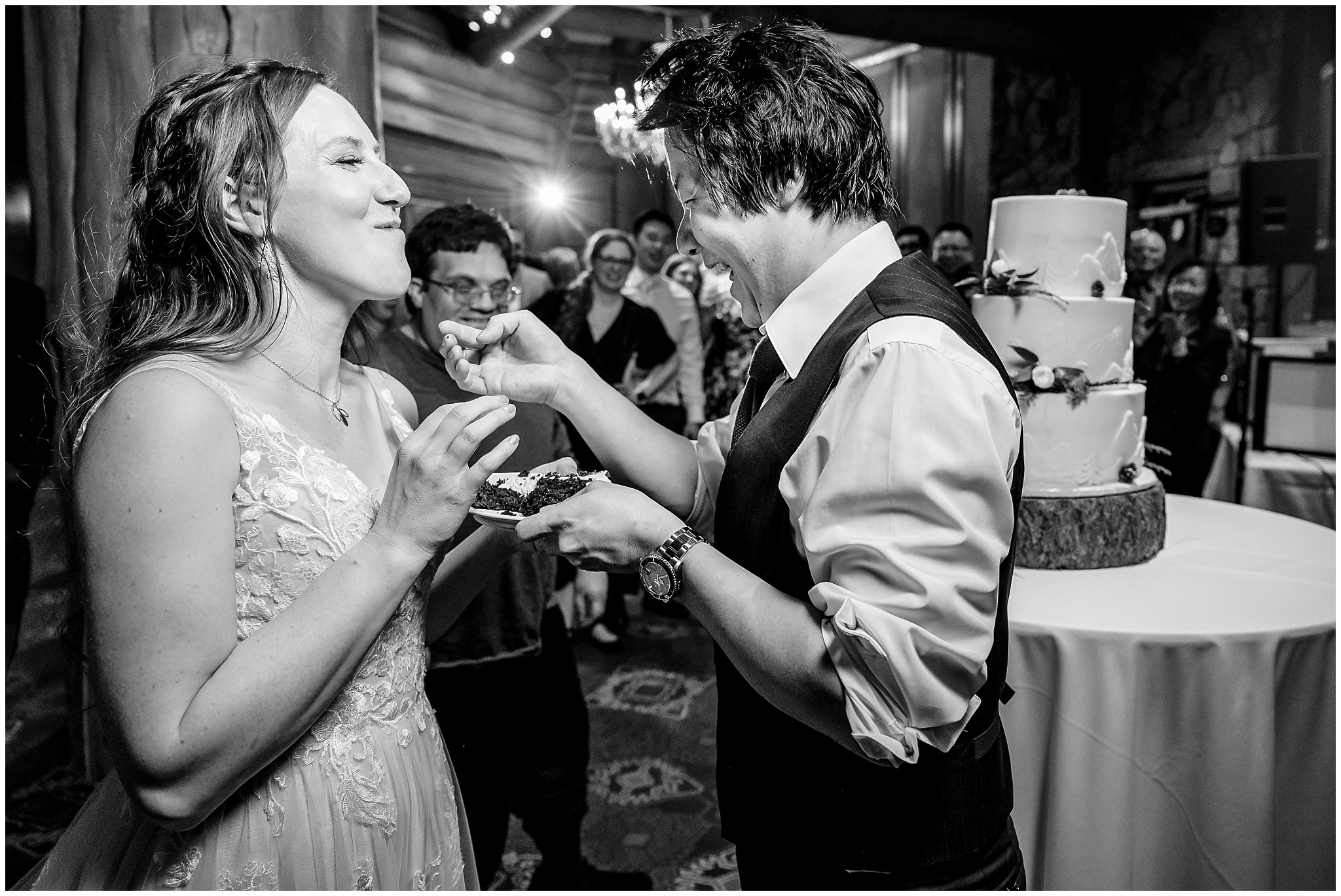 Cake cutting during reception inside Earl's Lodge for a winter wedding | Snowbasin Resort Winter Wedding | Jessie and Dallin Photography