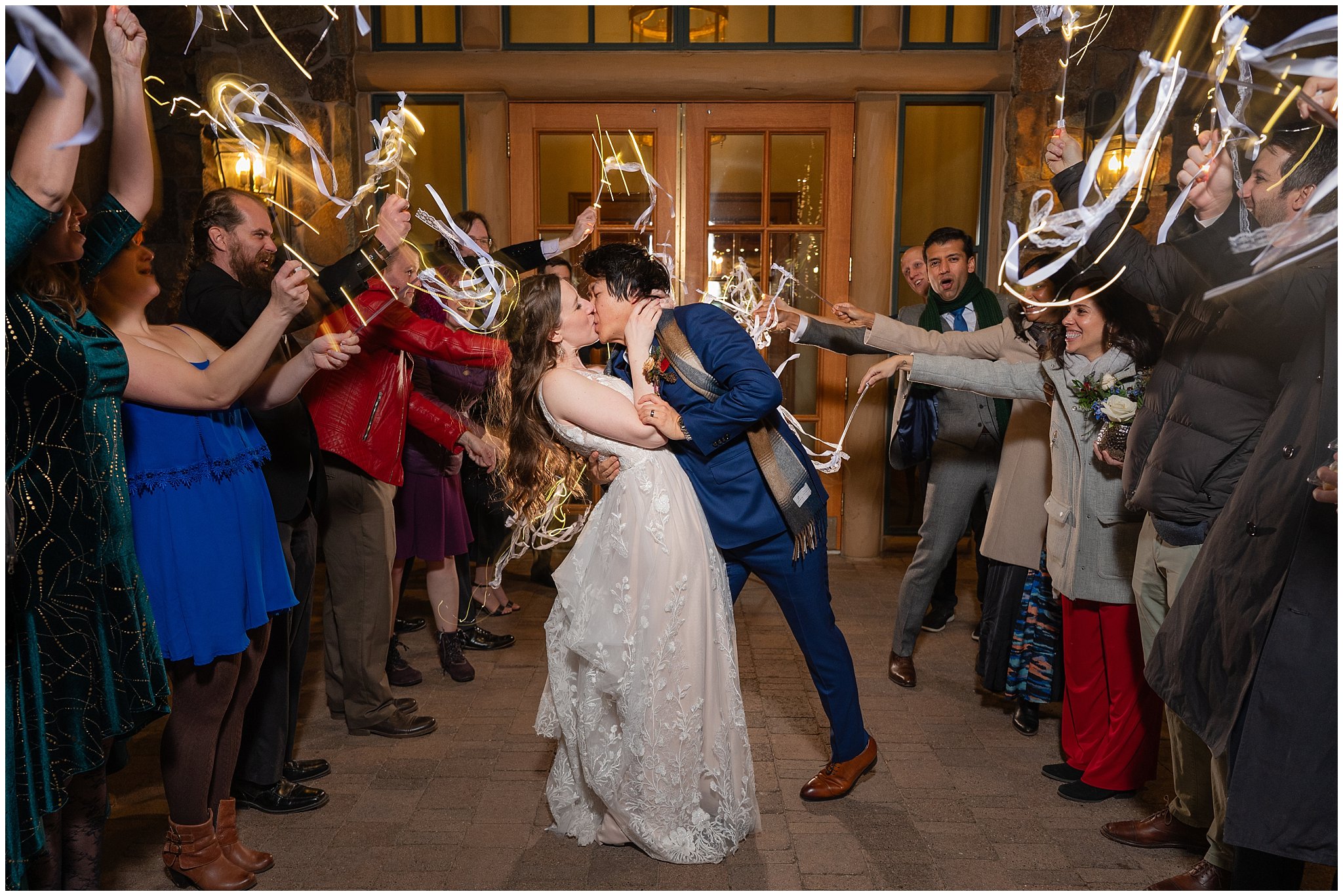 Light up ribbon wand sendoff after reception inside Earl's Lodge for a winter wedding | Snowbasin Resort Winter Wedding | Jessie and Dallin Photography