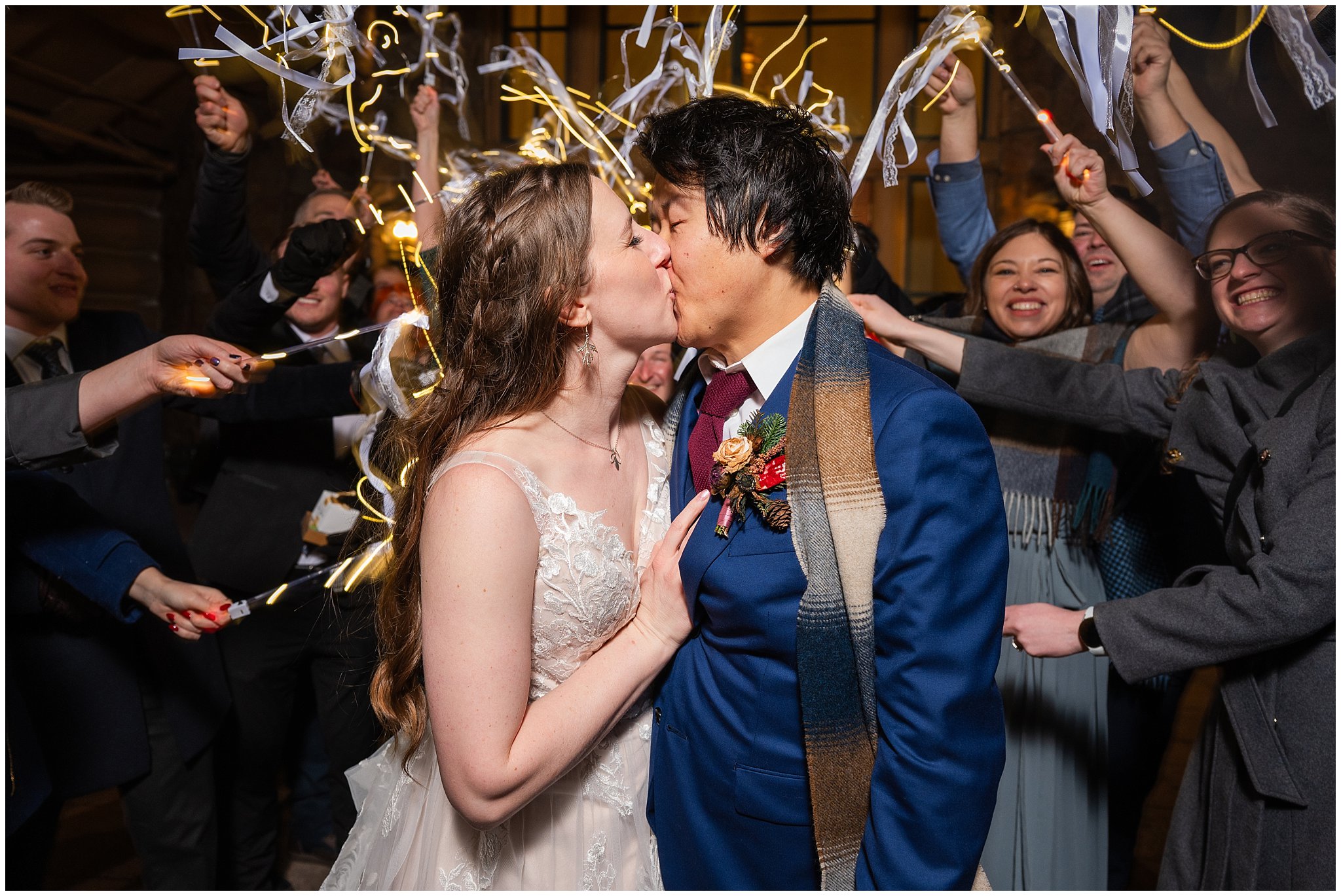 Light up ribbon wand sendoff after reception inside Earl's Lodge for a winter wedding | Snowbasin Resort Winter Wedding | Jessie and Dallin Photography