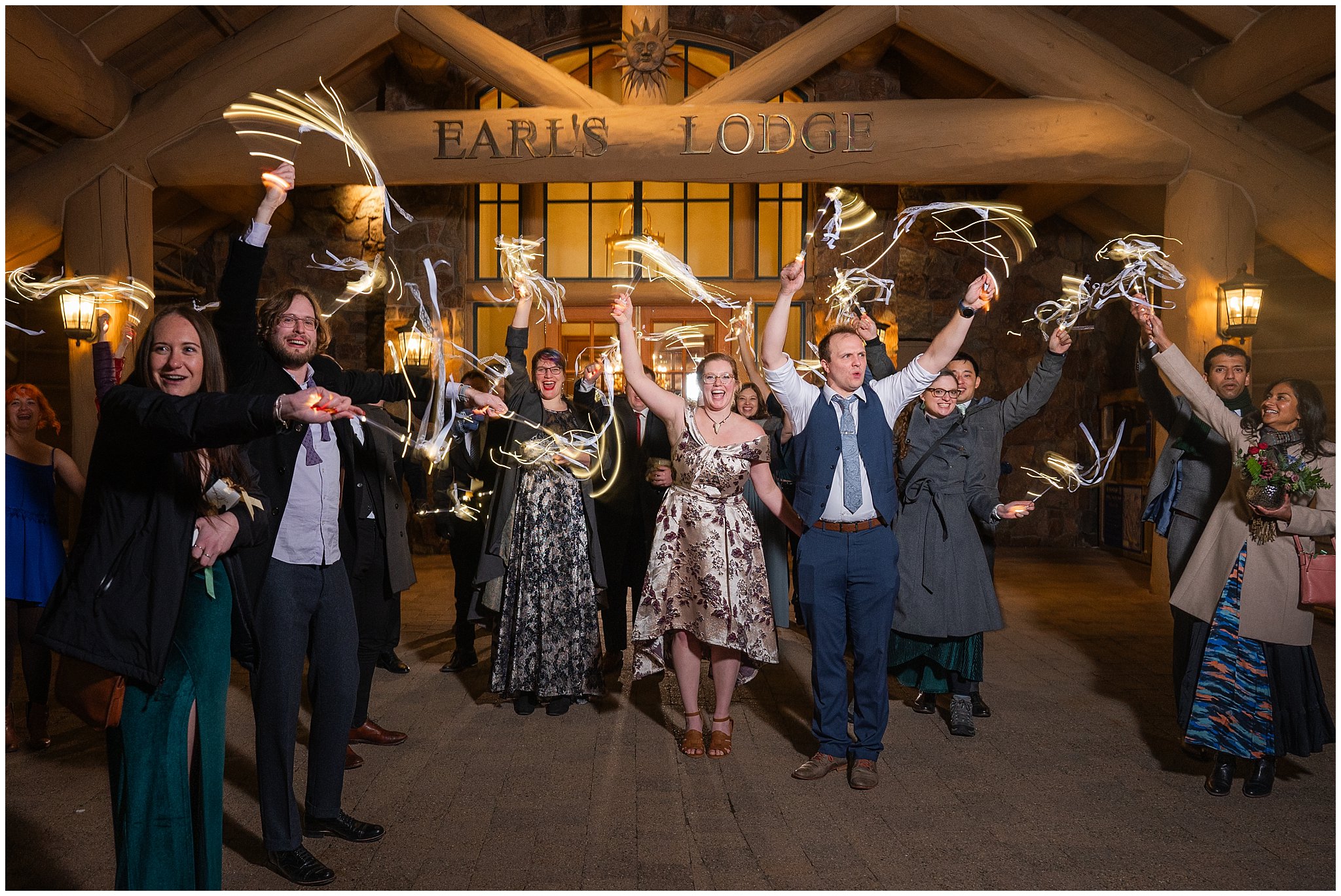 Light up ribbon wand sendoff after reception inside Earl's Lodge for a winter wedding | Snowbasin Resort Winter Wedding | Jessie and Dallin Photography