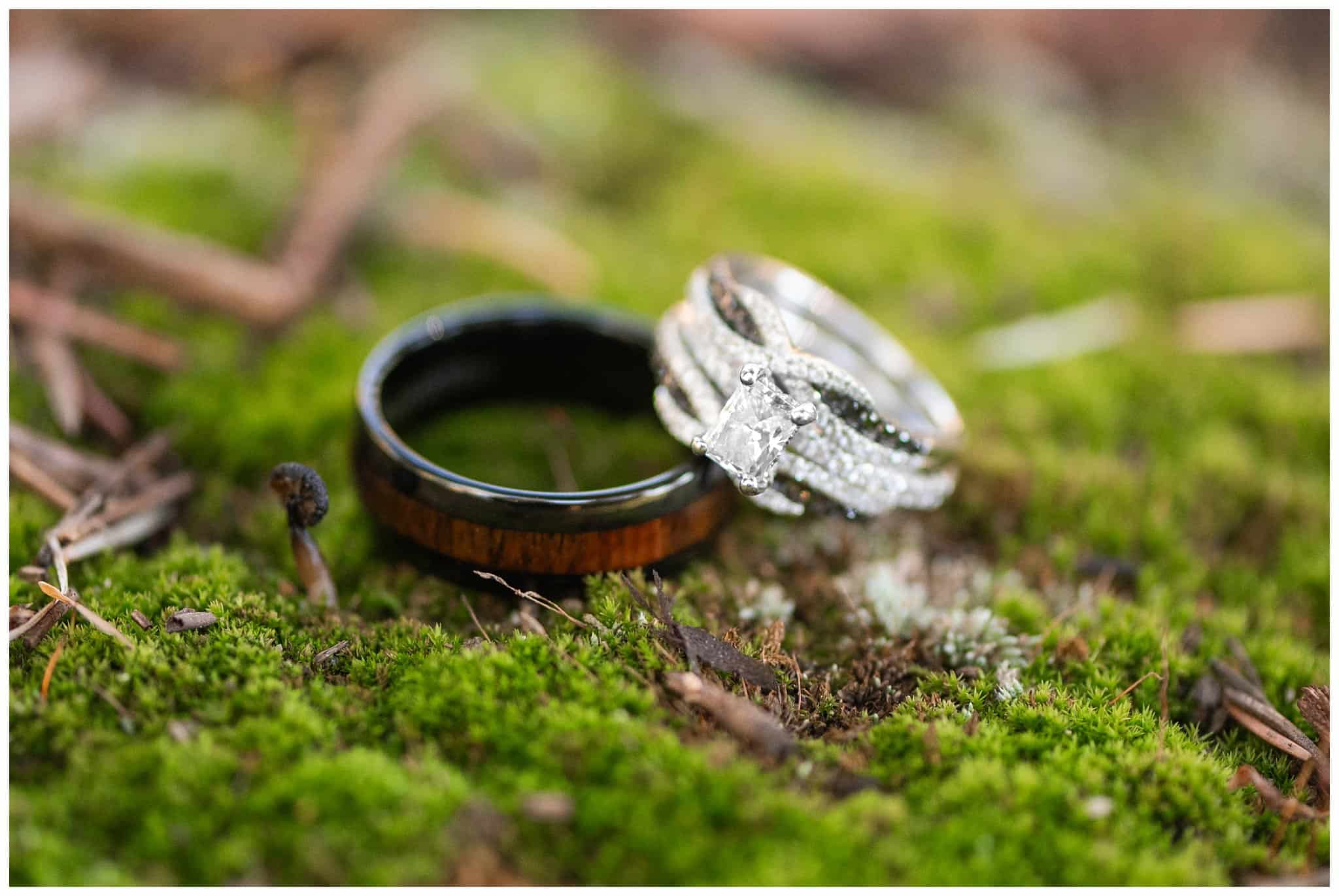 Wedding rings on moss at Boulder Brook on Fall River in Estes Park | Fall Rocky Mountain National Park Elopement | Jessie and Dallin Photography