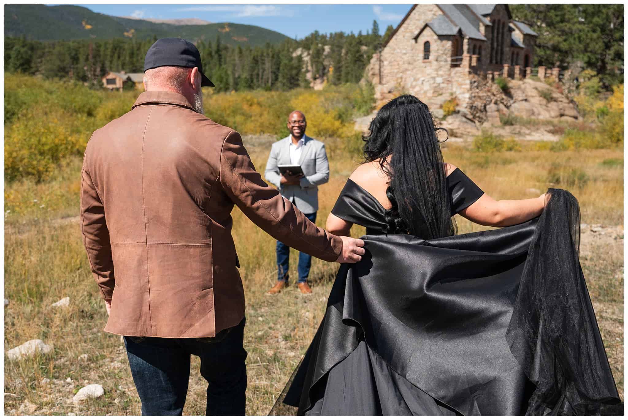 Elopement ceremony in the fall outside of the Church on the Rock at Estes Park | Fall Rocky Mountain National Park Elopement | Jessie and Dallin Photography