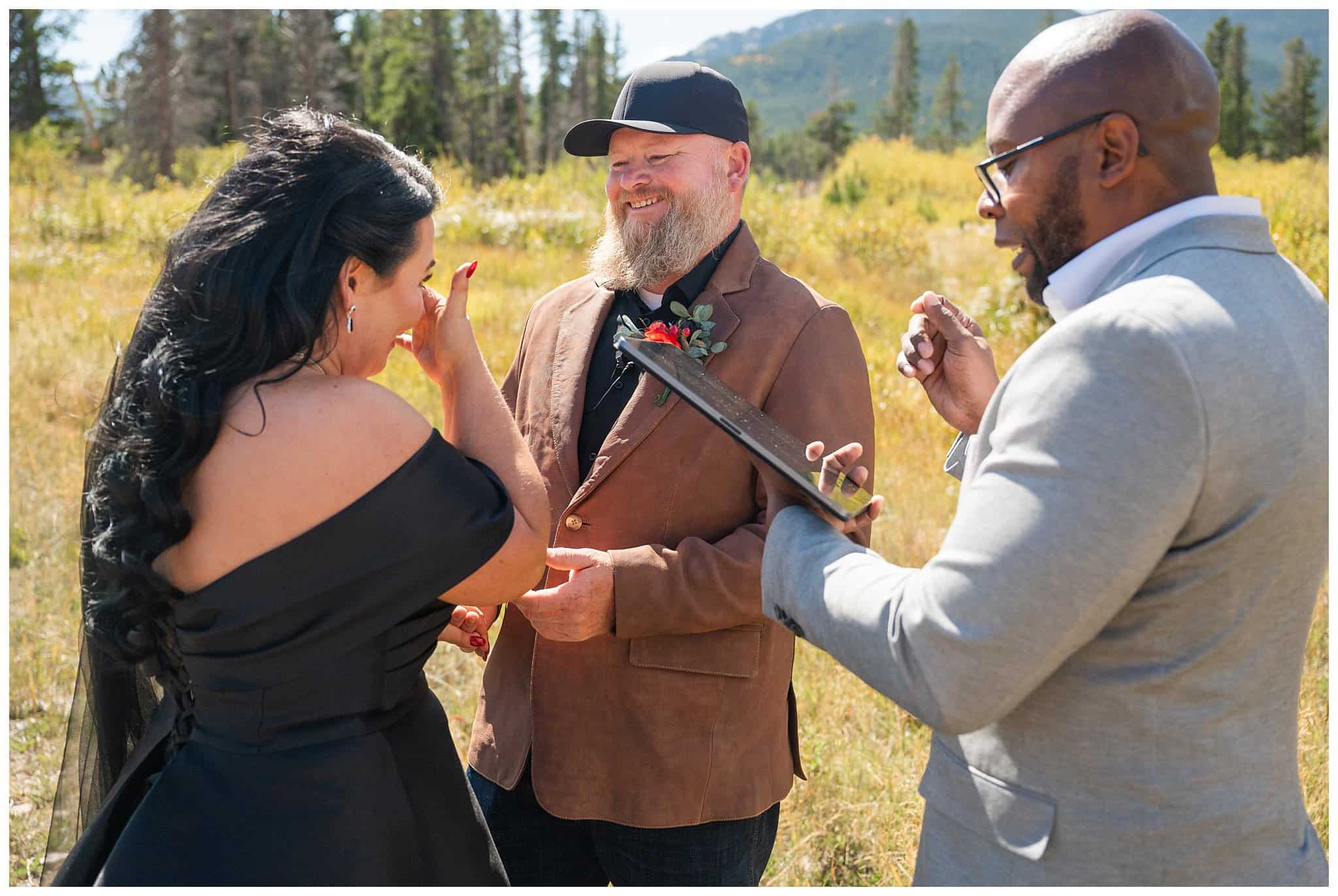 Elopement ceremony in the fall outside of the Church on the Rock at Estes Park | Fall Rocky Mountain National Park Elopement | Jessie and Dallin Photography