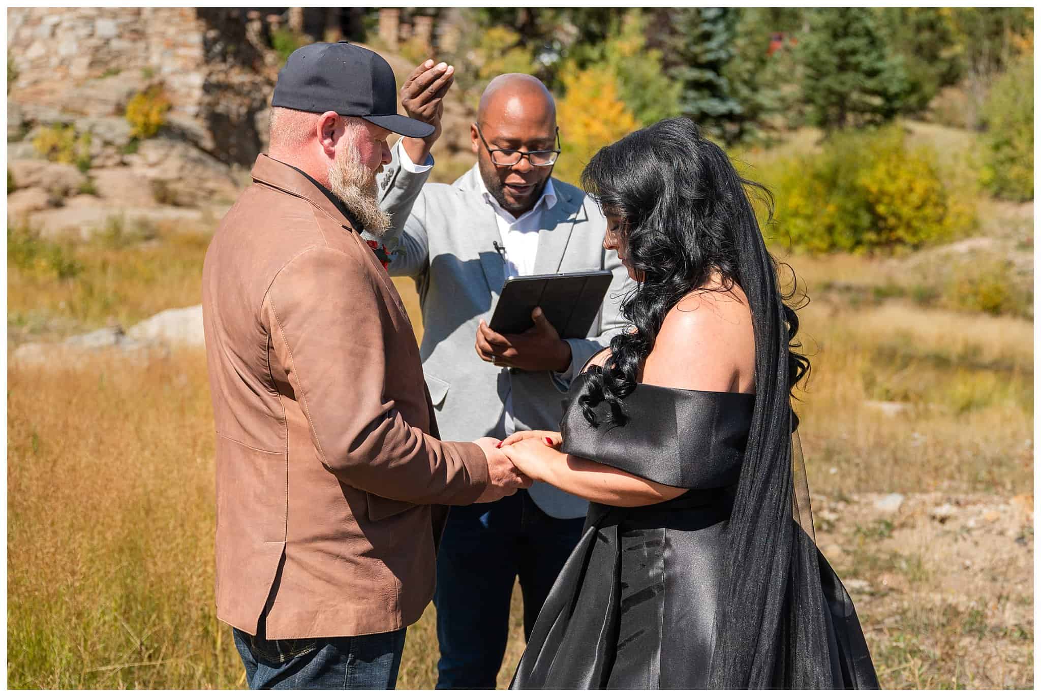 Elopement ceremony in the fall outside of the Church on the Rock at Estes Park | Fall Rocky Mountain National Park Elopement | Jessie and Dallin Photography