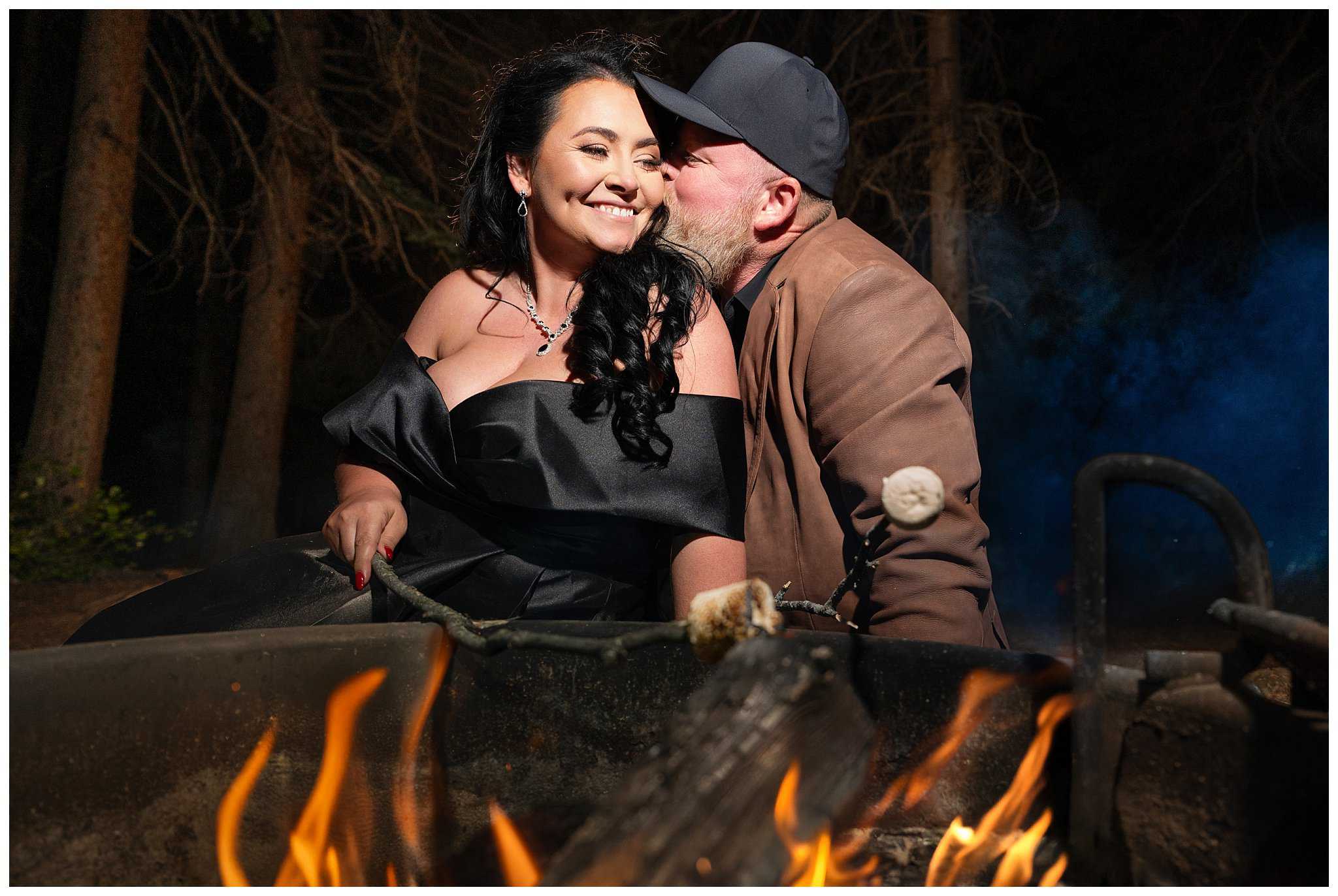 Bride and groom make smores over the campfire at Rocky National Park | Fall Rocky Mountain National Park Elopement | Jessie and Dallin Photography