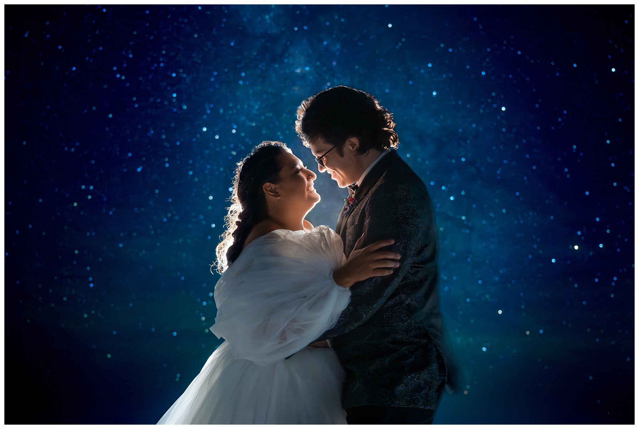Bride and Groom share a moment together beneath the Milky Way at the Bonneville Salt Flats during inspiration elopement | Jessie and Dallin Photography