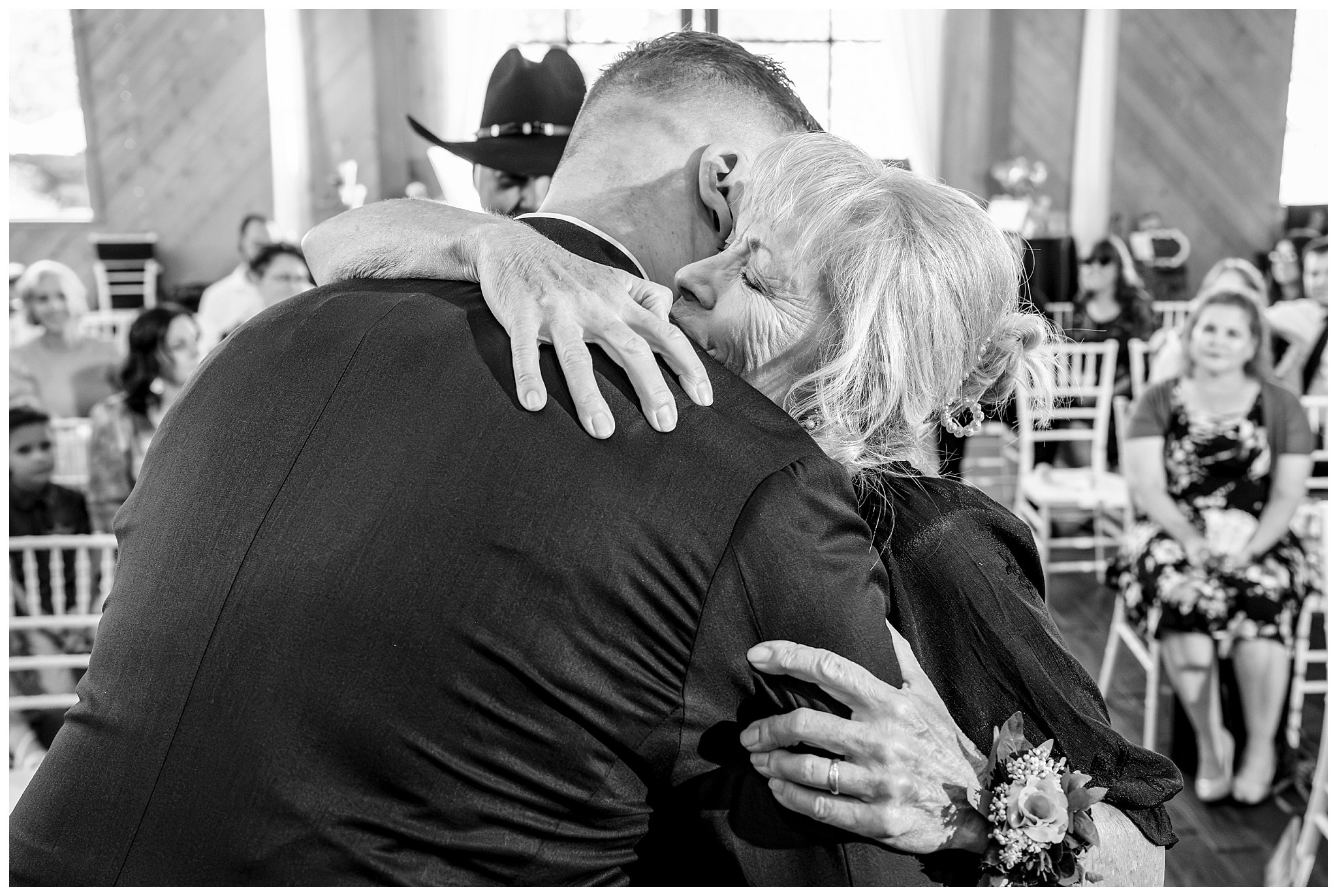 Mother of the bride hugs the groom at the top of the aisle during ceremony at Oak HIlls | Star Wars Themed Wedding at Oak Hills Utah | Jessie and Dallin Photography