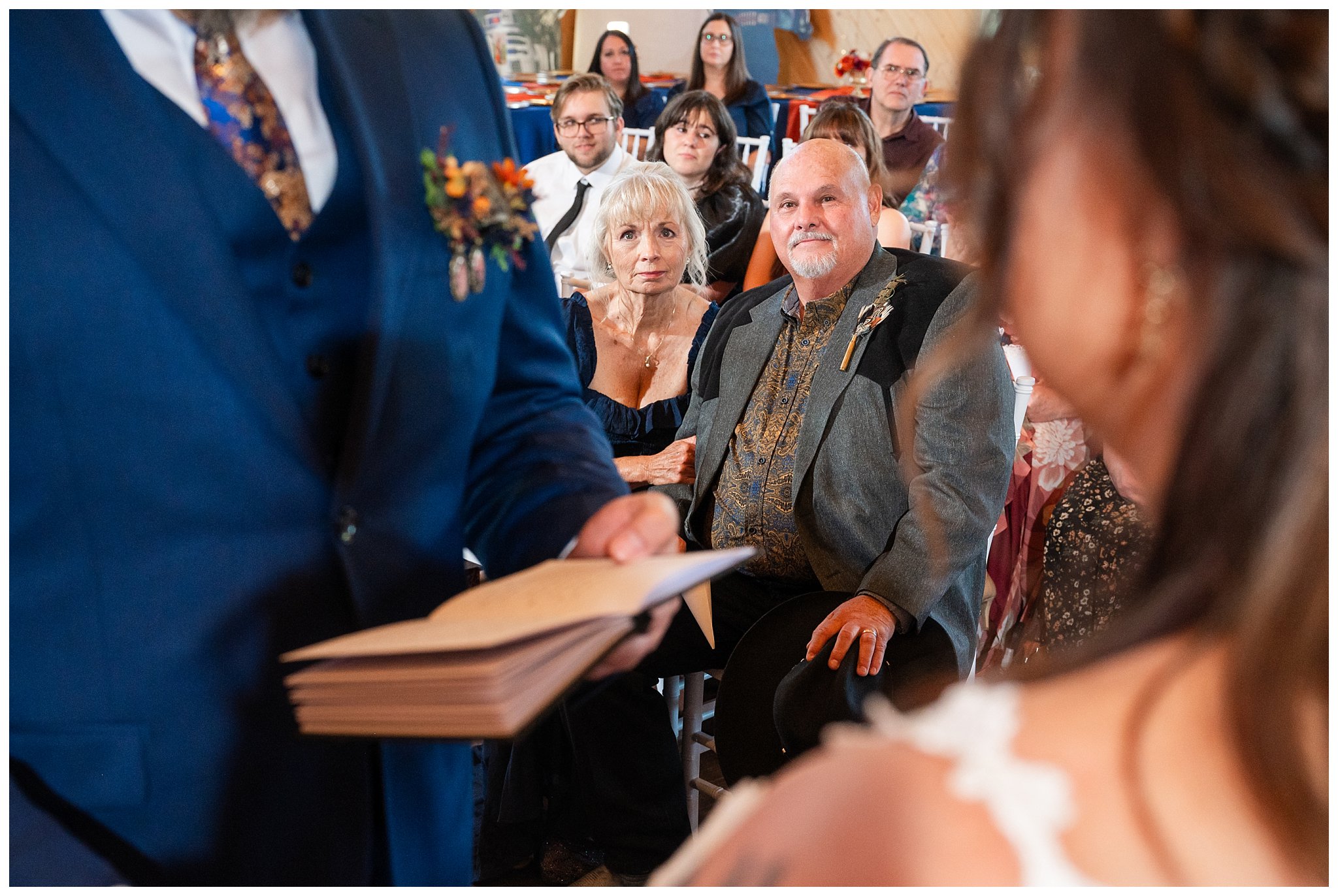 Wedding ceremony moments with parents watching from the seats, inside the barn at Oak Hills | Star Wars Themed Wedding at Oak Hills Utah | Jessie and Dallin Photography