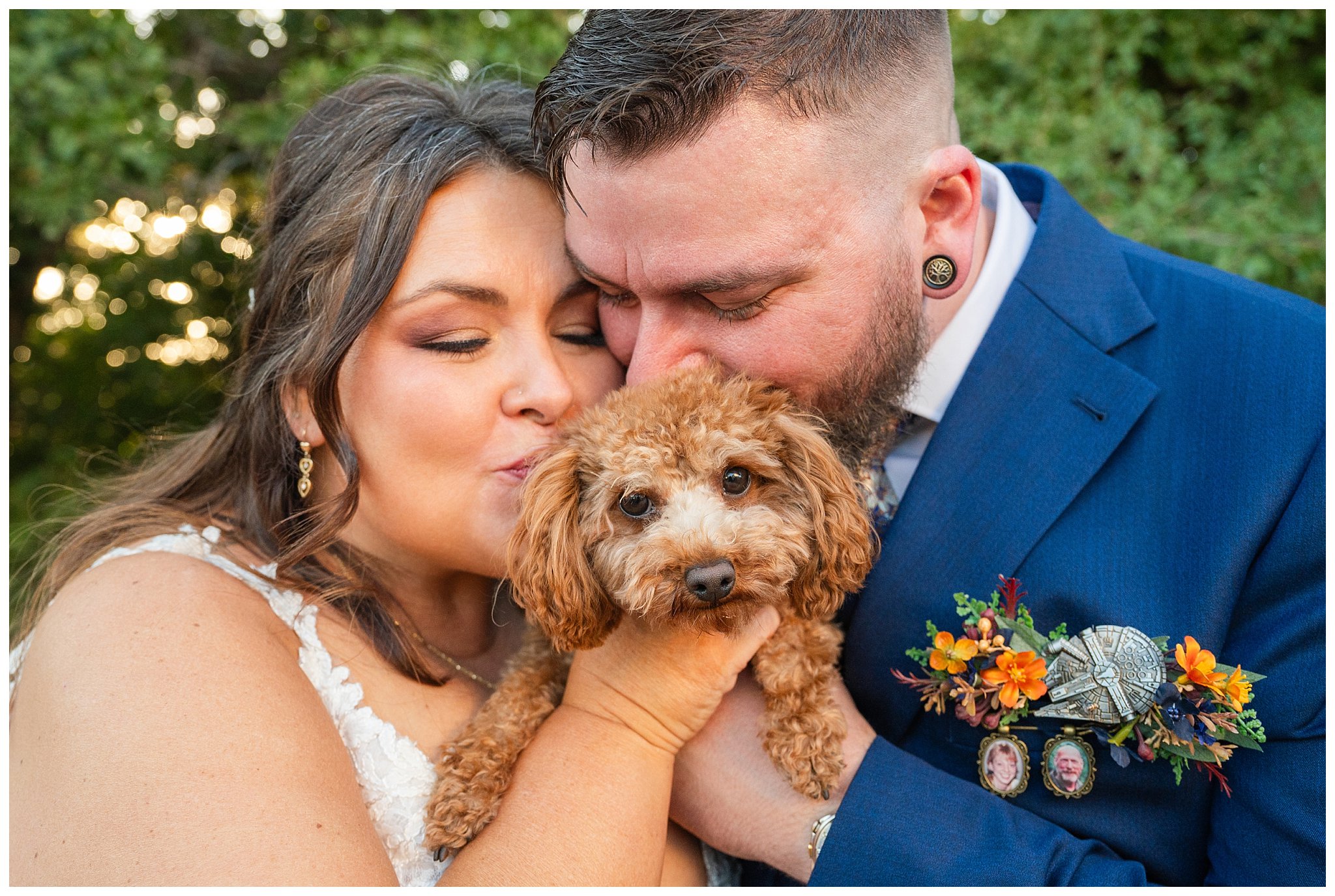 Bride and groom share moments with their dog named Chewie who is wearing a small tux and bowtie. Bride in lace dress and groom in custom blue suit with Star Wars details | Star Wars Themed Wedding at Oak Hills Utah | Jessie and Dallin Photography