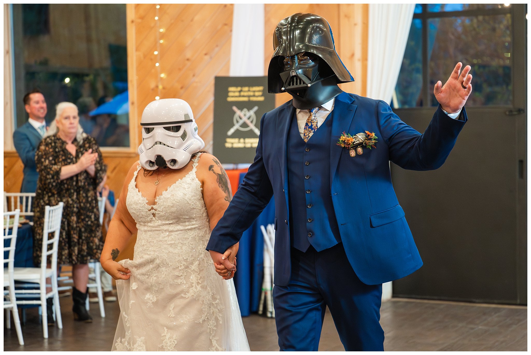 Bride and groom grand entrance to dinner wearing Darth Vader helmet and Stormtrooper helmet | Star Wars Themed Wedding at Oak Hills Utah | Jessie and Dallin Photography