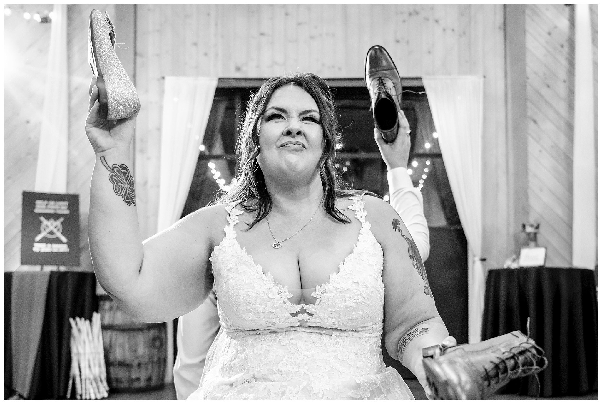 Bride and groom make funny faces while playing the shoe game in the barn at Oak Hills | Star Wars Themed Wedding at Oak Hills Utah | Jessie and Dallin Photography