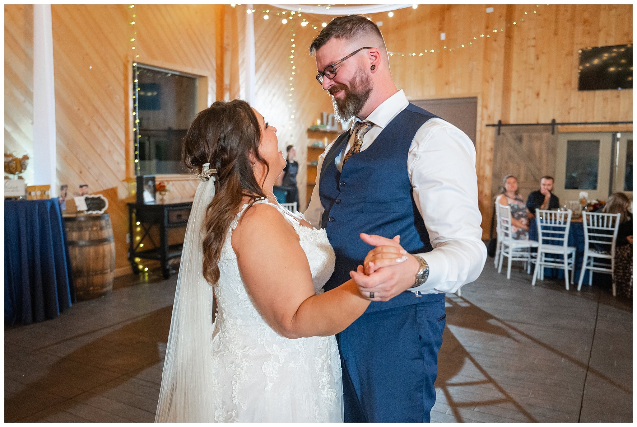 Bride and groom share emotional moment during first dance in the barn at Oak Hills | Star Wars Themed Wedding at Oak Hills Utah | Jessie and Dallin Photography